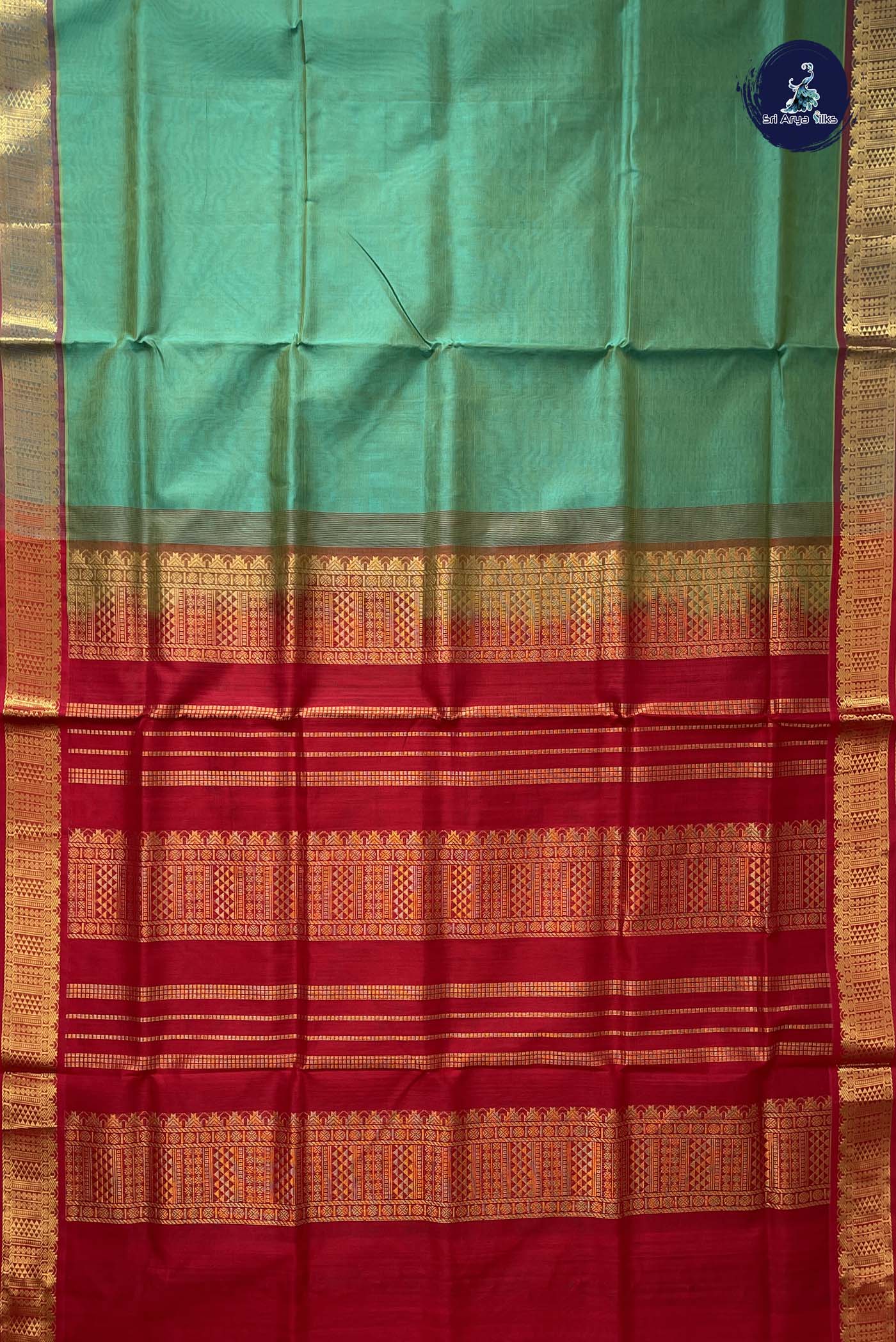 Dual Tone Green Simple Silk Cotton Saree With Plain Pattern