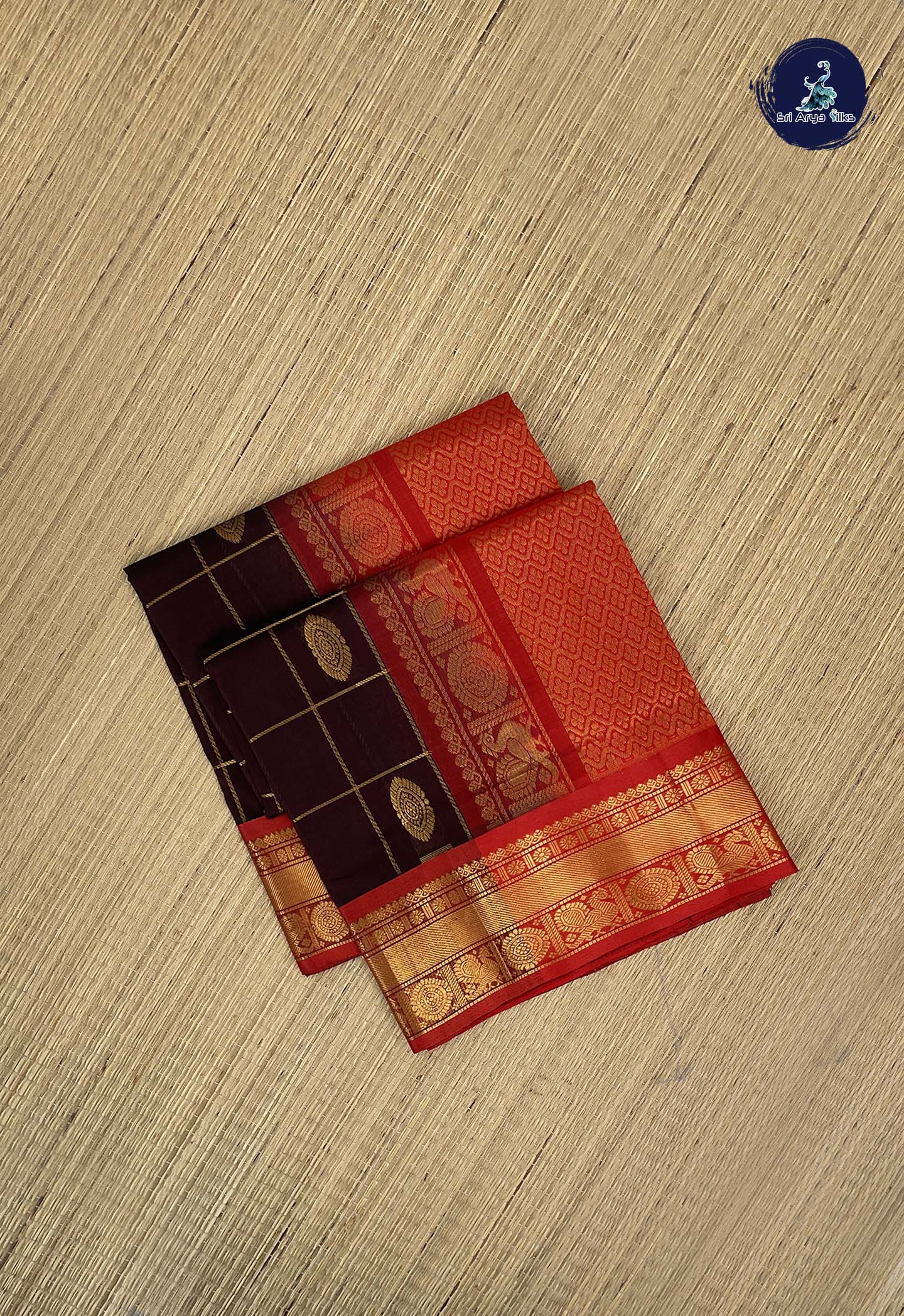 Brown Checked Saree With Mayil Chakram Butta Pattern