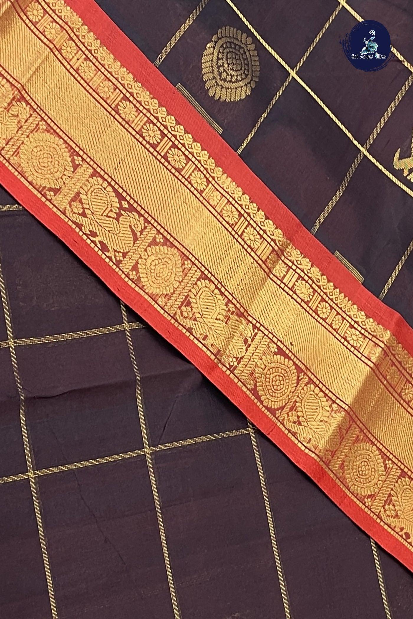 Brown Checked Saree With Mayil Chakram Butta Pattern