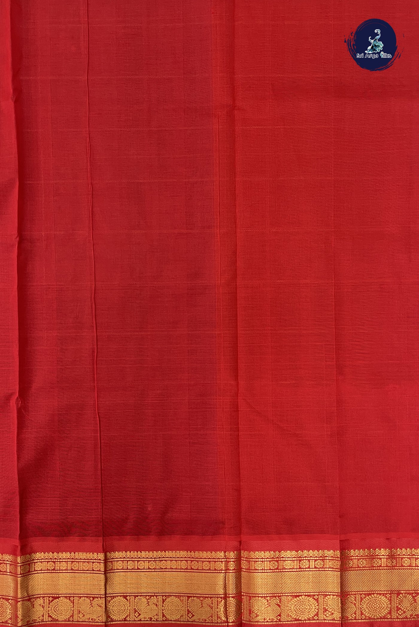 Brown Checked Saree With Mayil Chakram Butta Pattern