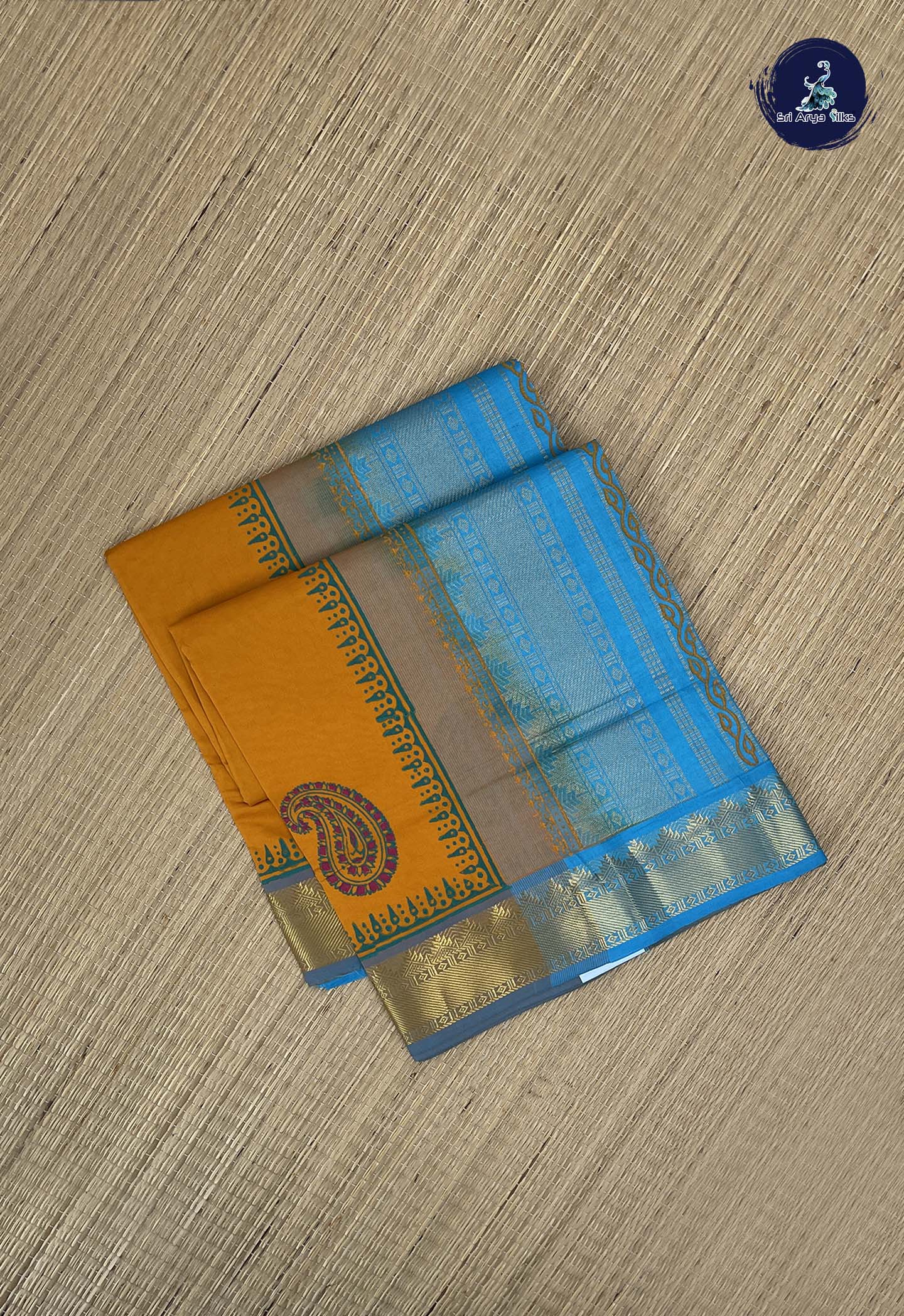 Turmeric Yellow Kanchi Semi Silk Cotton Saree With Printed Pattern