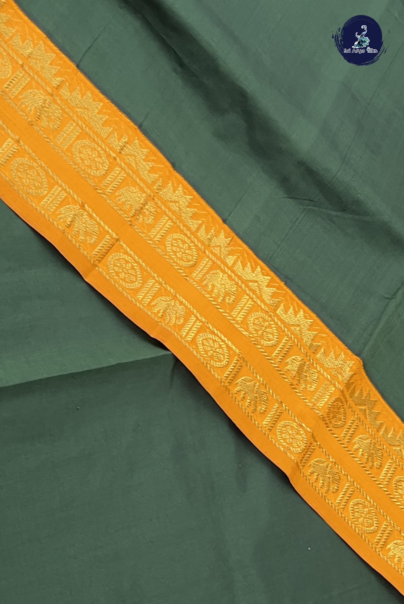 Dark Green Kanchi Semi Silk Cotton Saree With Plain Pattern