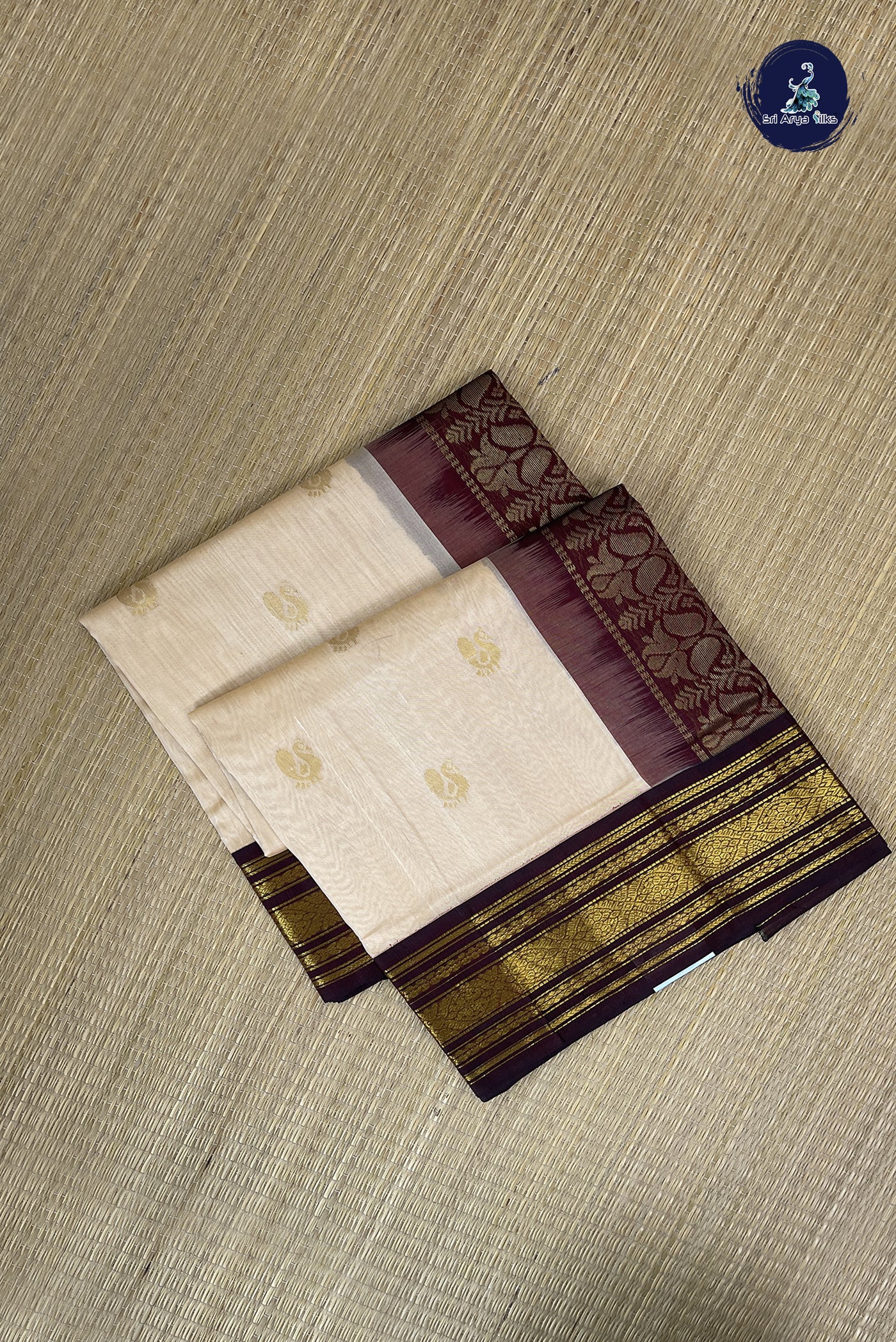 Cream Korvai Silk Cotton Saree With Zari Buttas Pattern