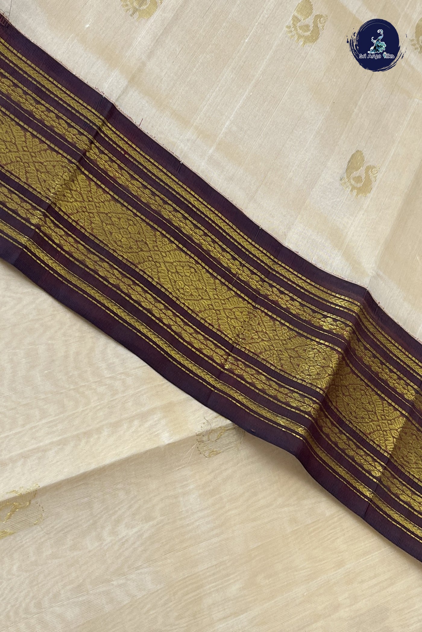 Cream Korvai Silk Cotton Saree With Zari Buttas Pattern