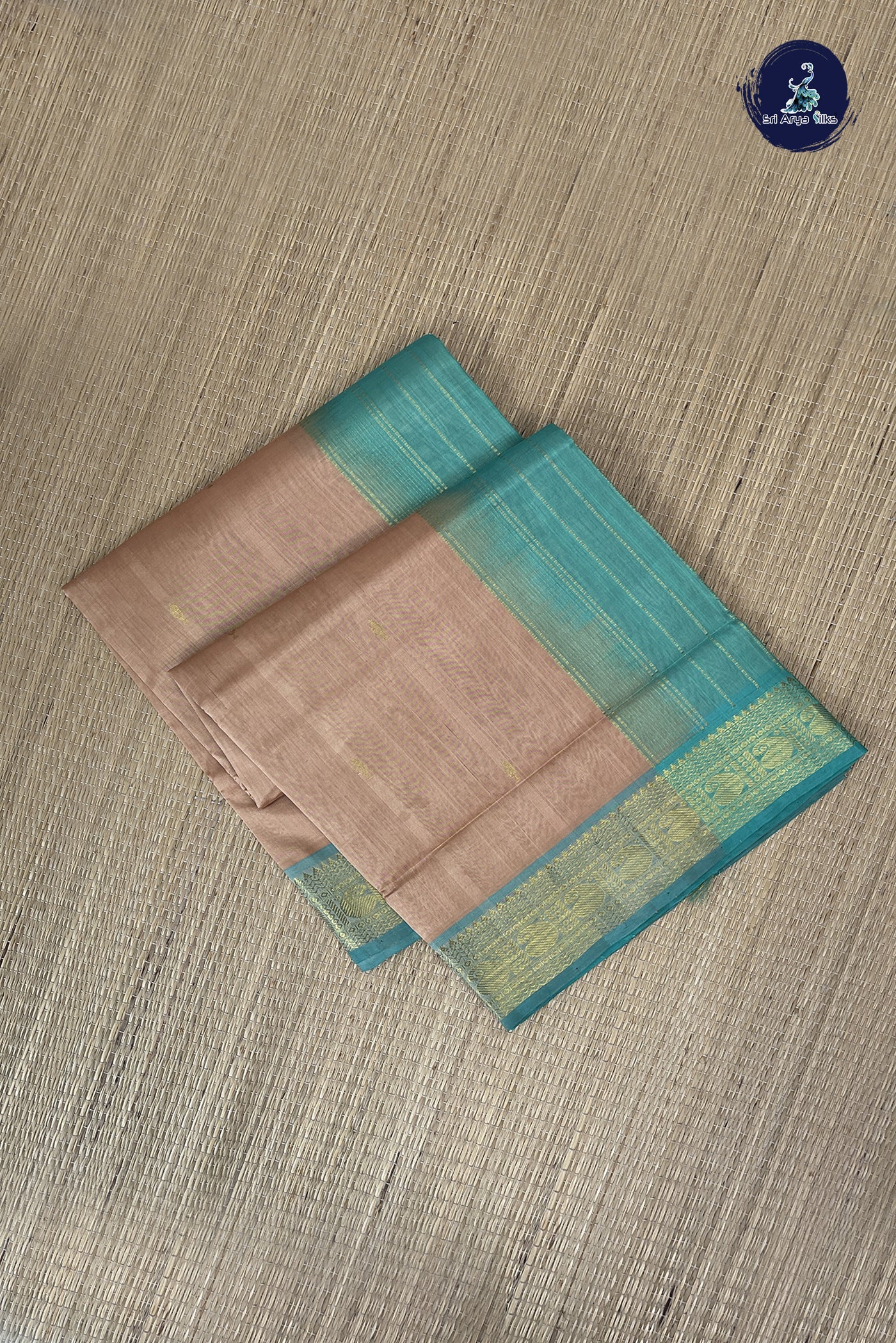 Chikku Shade Simple Silk Cotton Saree With Zari Buttas Pattern