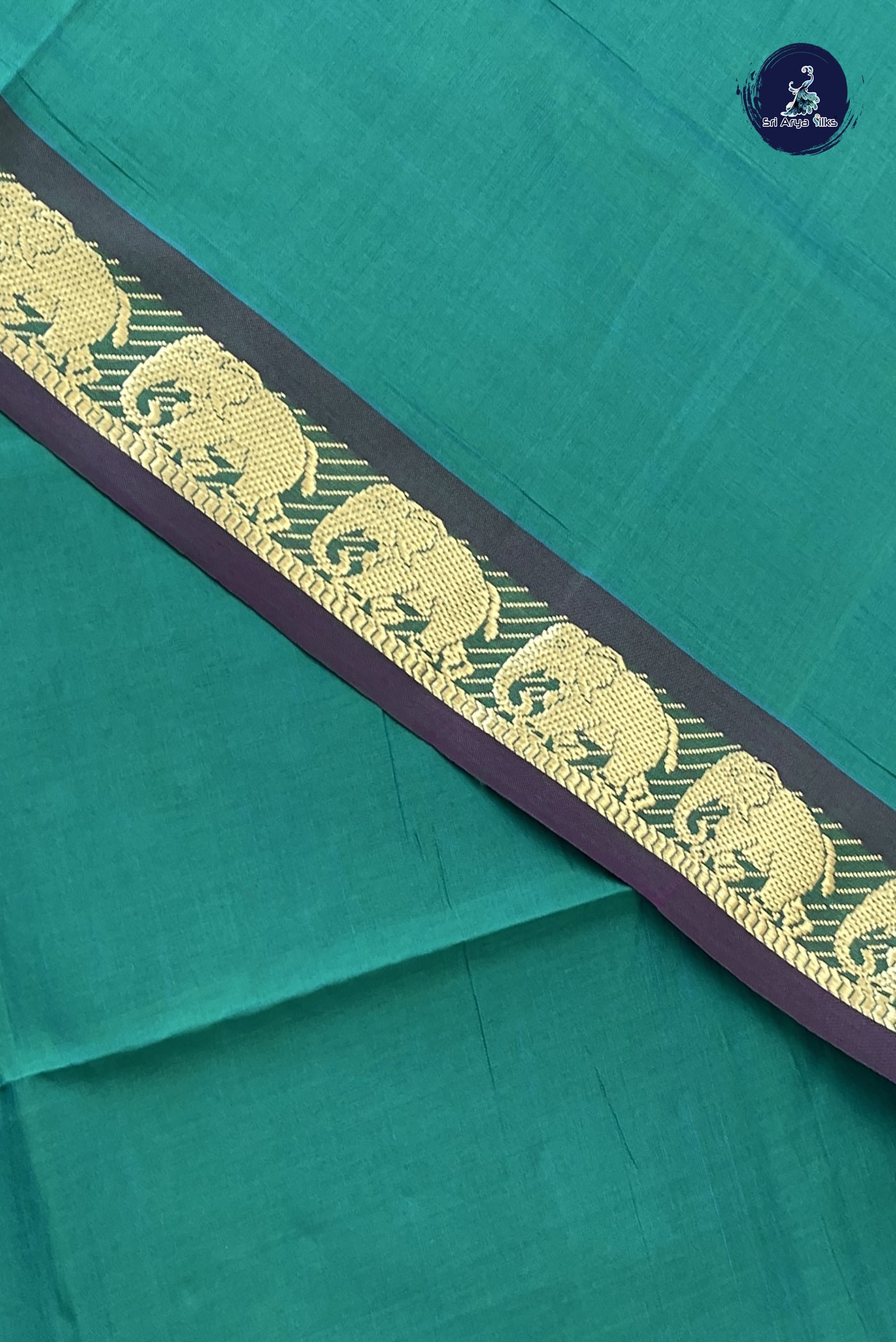 Green Kanchi Semi Silk Cotton Saree With Plain Pattern