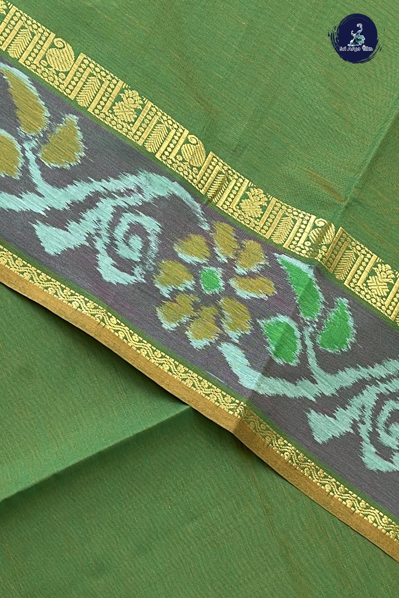Green Kanchi Semi Silk Cotton Saree With Plain Pattern