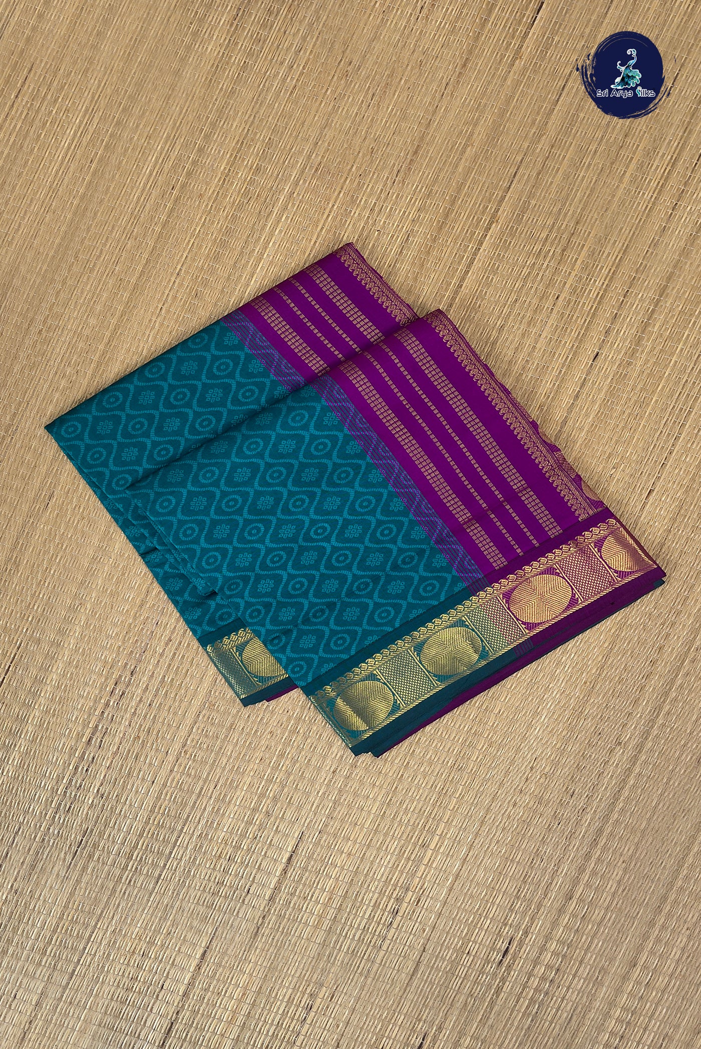 Teal Blue Half Pure Silk Cotton Saree With Embossed Pattern