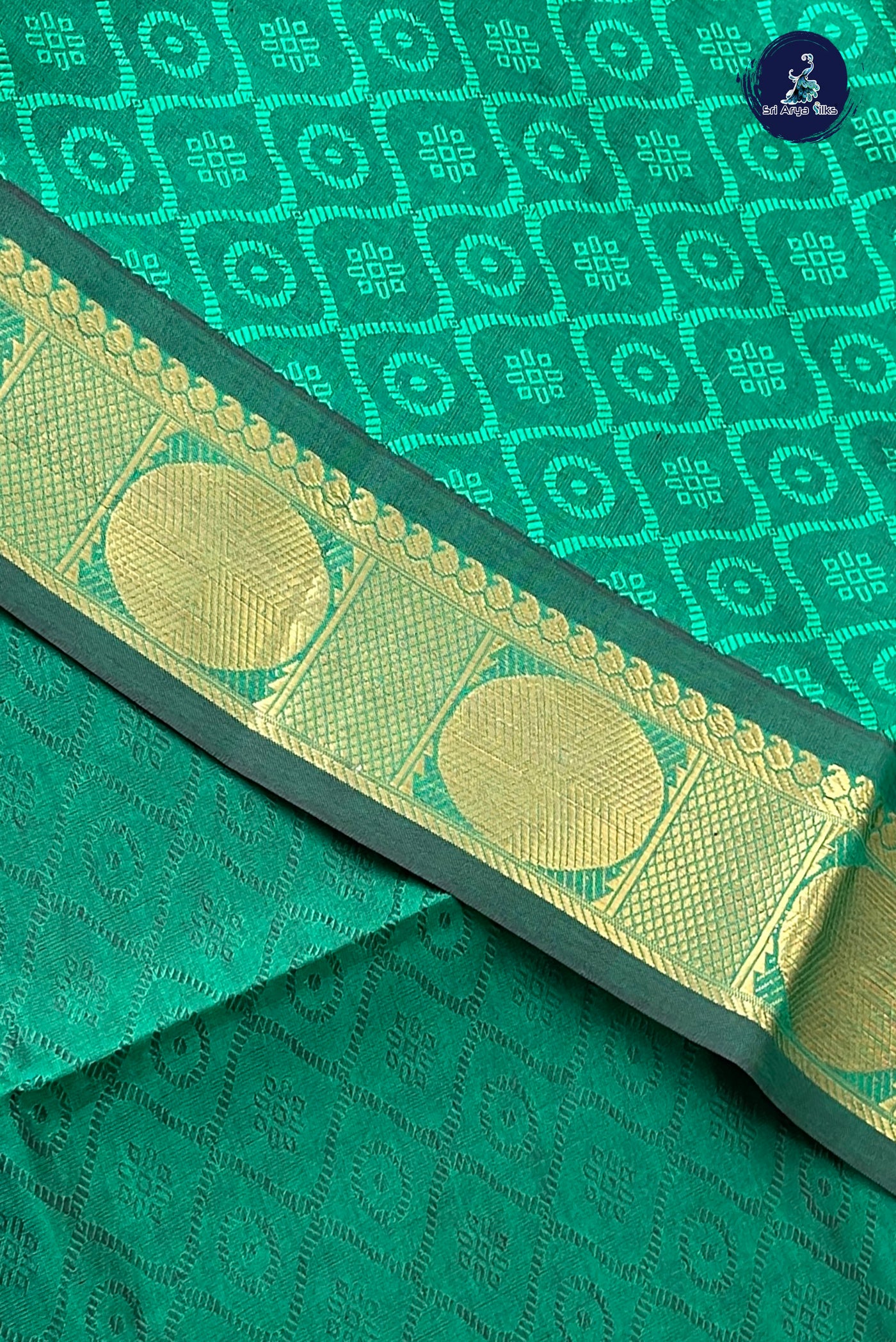 Dark Green Half Pure Silk Cotton Saree With Embossed Pattern