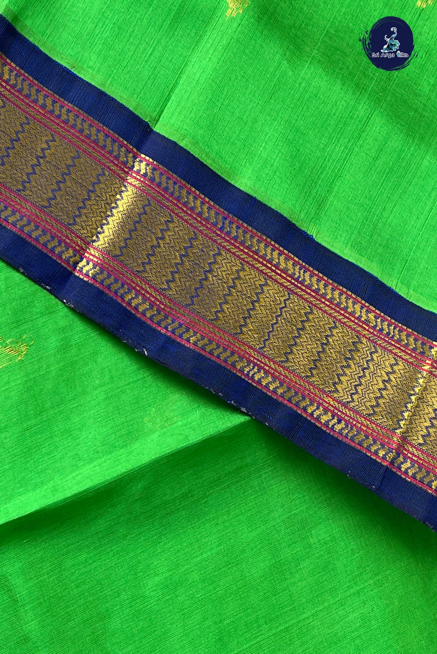 Parrot Green Korvai Silk Cotton Saree With Zari Buttas Pattern