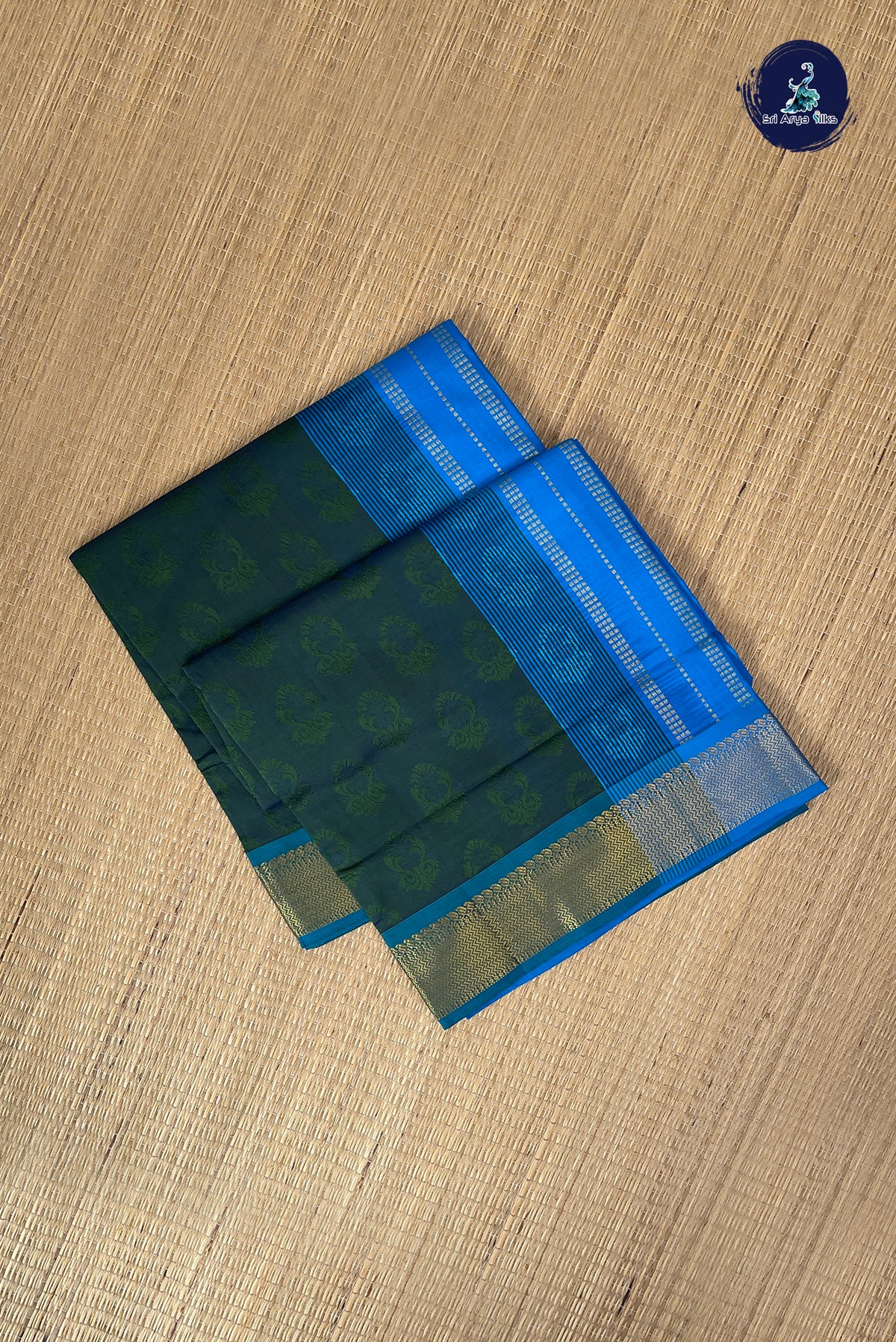 Dark Green Half Pure Silk Cotton Saree With Embossed Pattern
