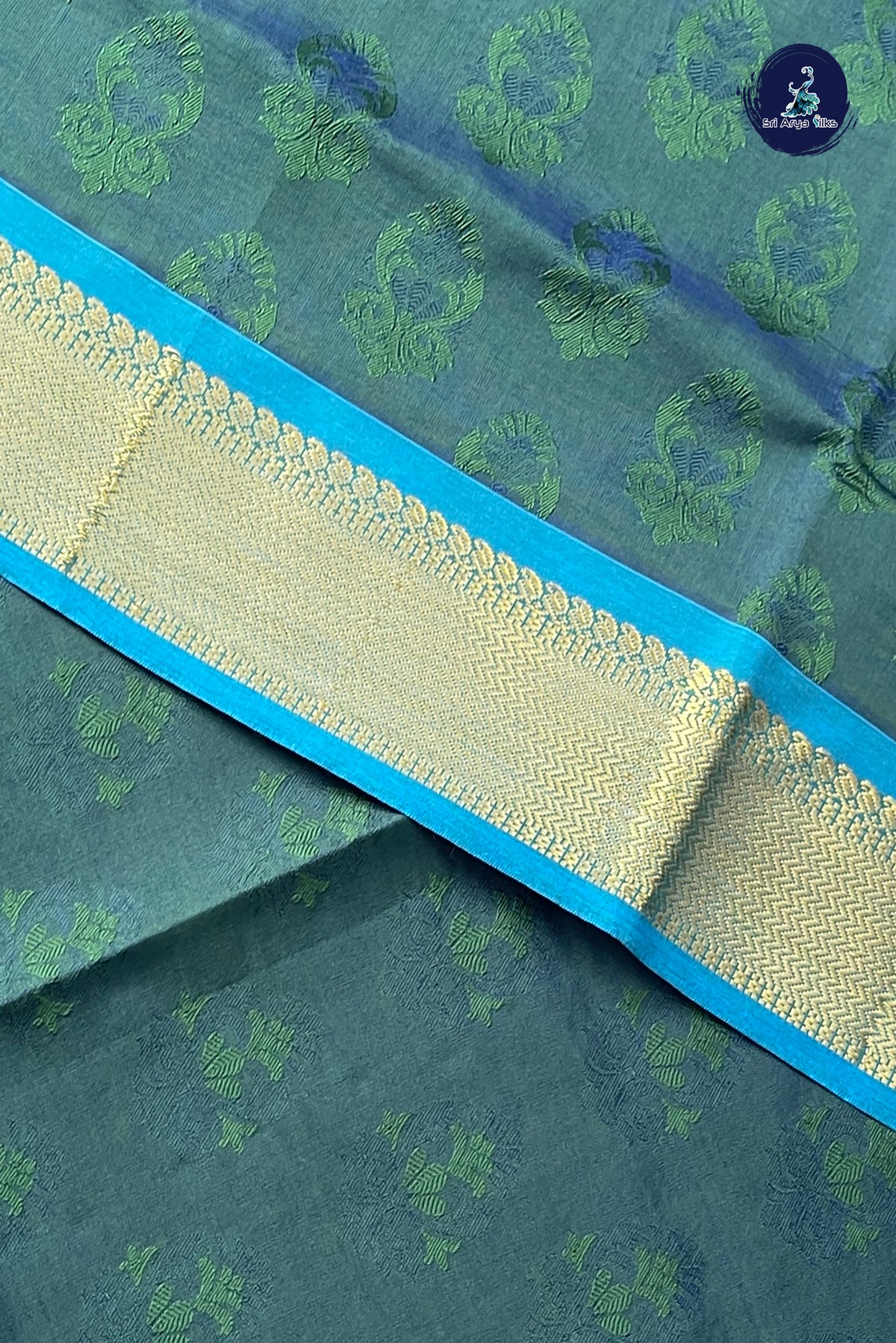 Dark Green Half Pure Silk Cotton Saree With Embossed Pattern
