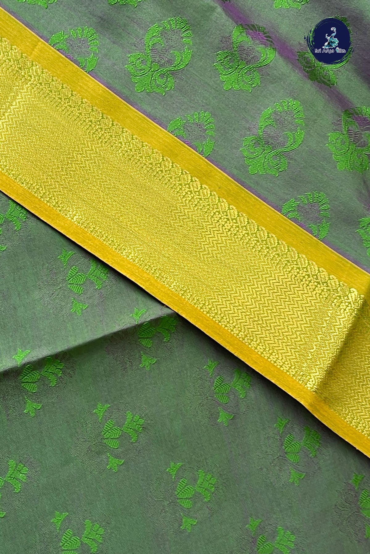 Dual Tone Green Half Pure Silk Cotton Saree With Embossed Pattern