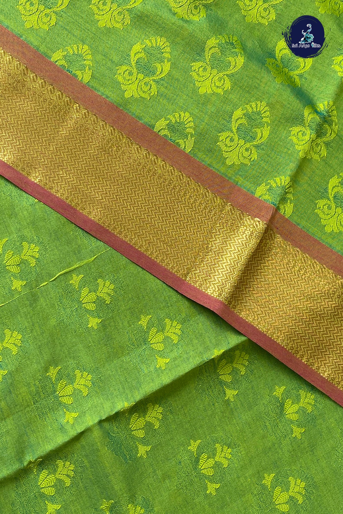 Light Green Half Pure Silk Cotton Saree With Embossed Pattern