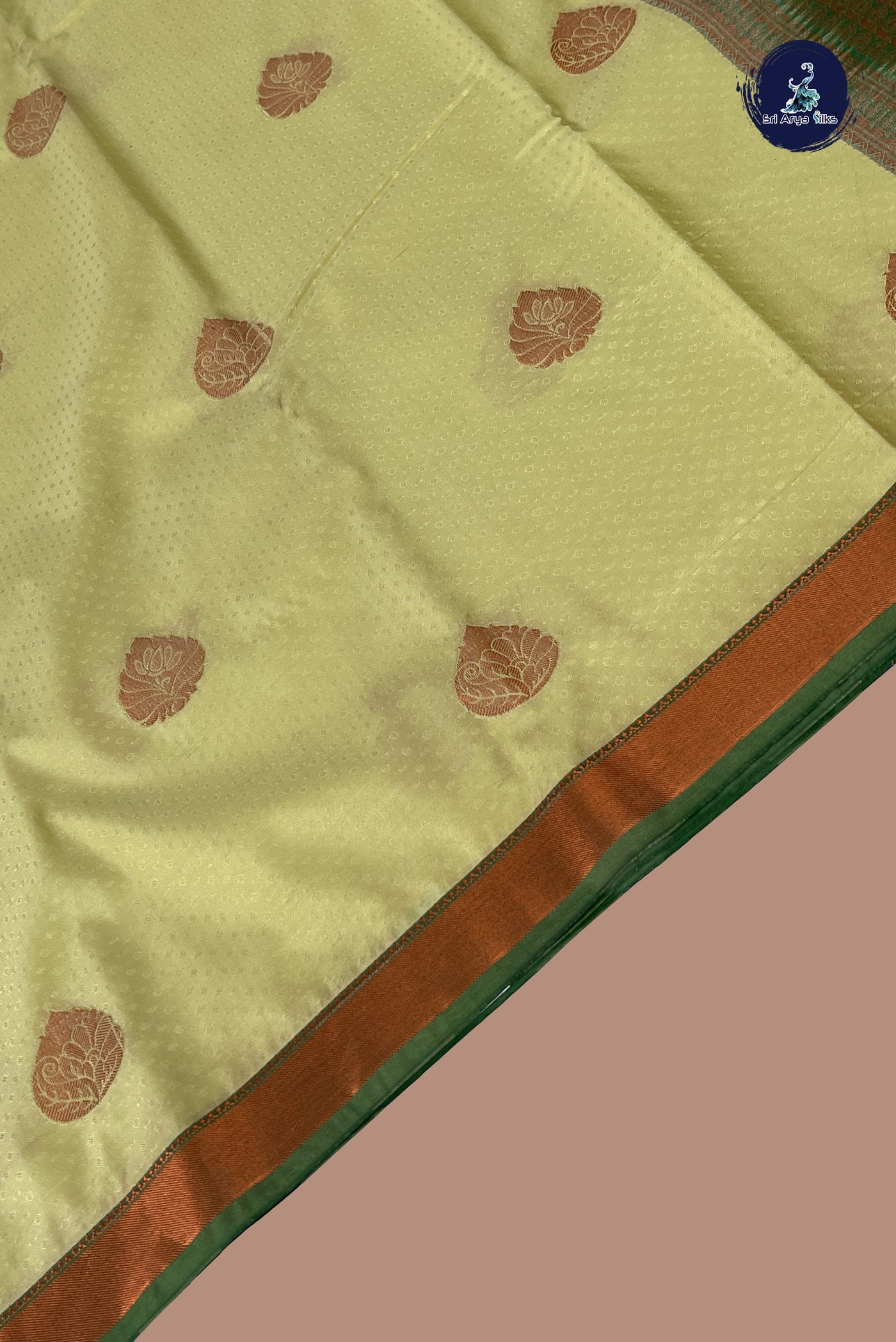 Creamish Yellow Semi Silk Saree With Copper Zari Buttas Pattern