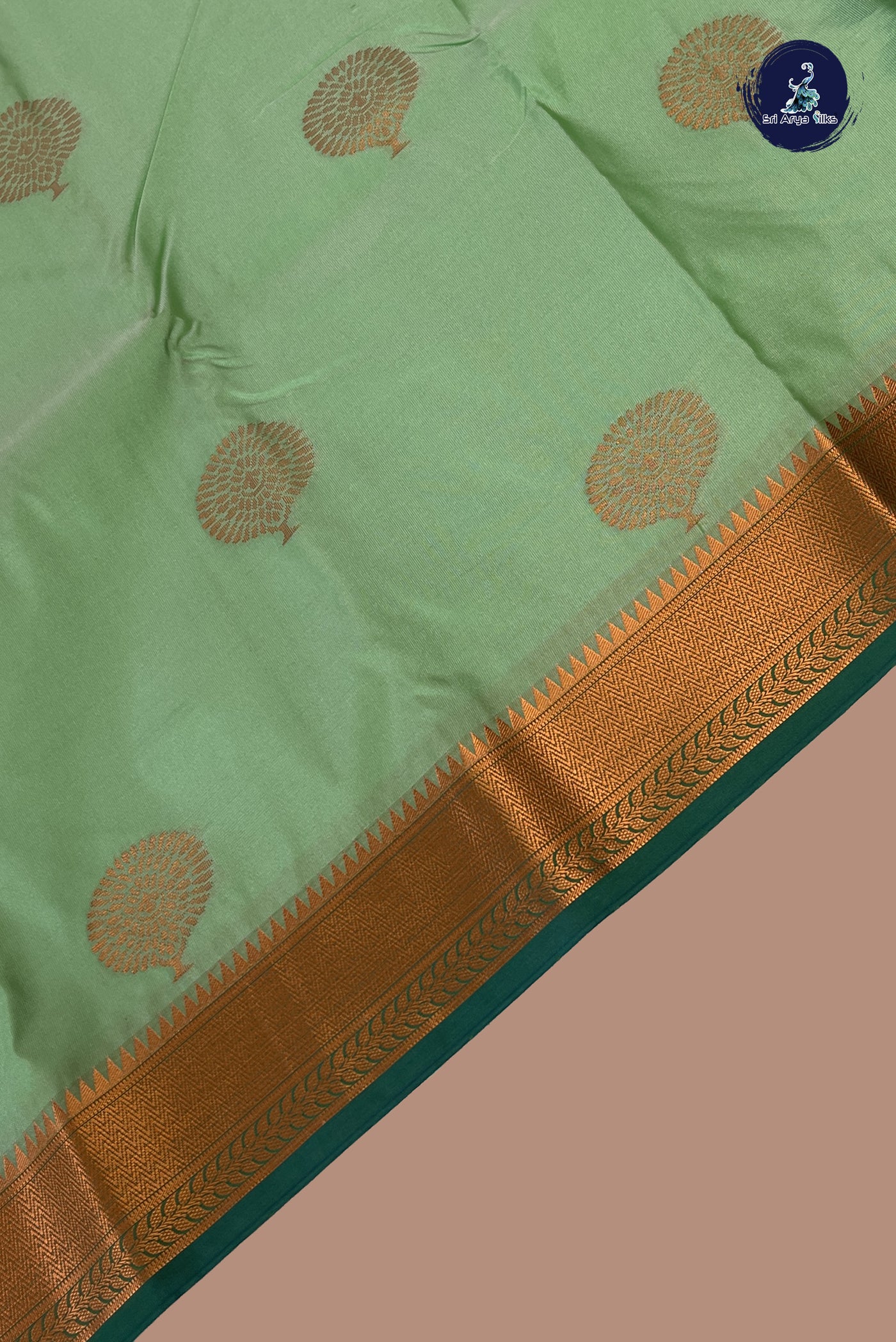 Turquoise Semi Silk Saree With Copper Zari Buttas Pattern