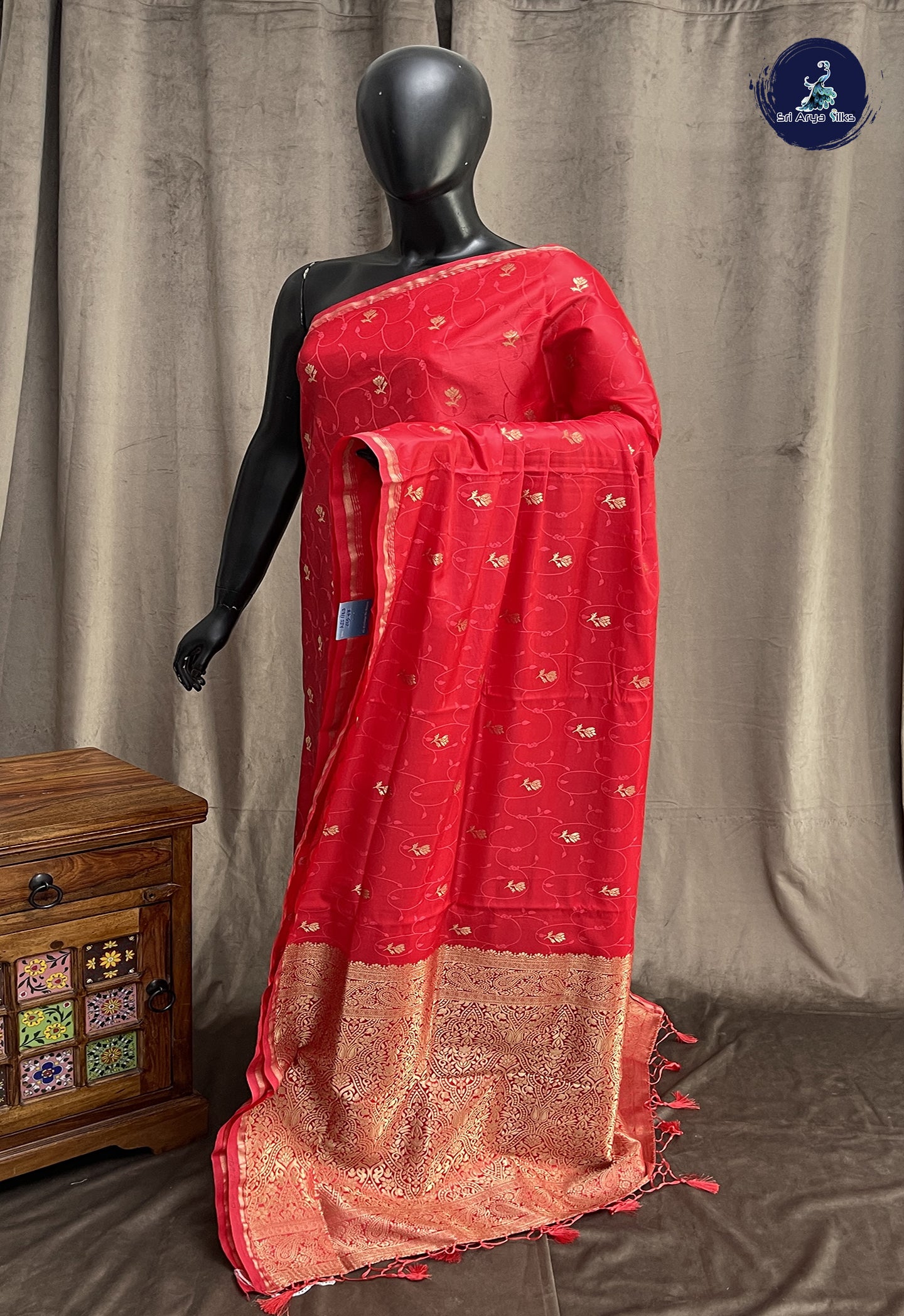 Bright Red Semi Soft Silk Saree With Embossed Pattern