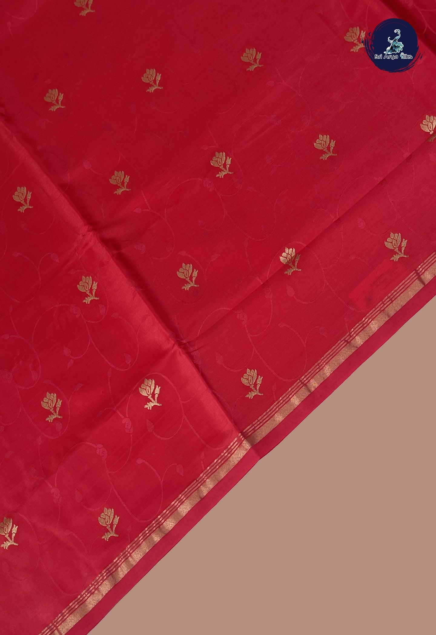 Bright Red Semi Soft Silk Saree With Embossed Pattern