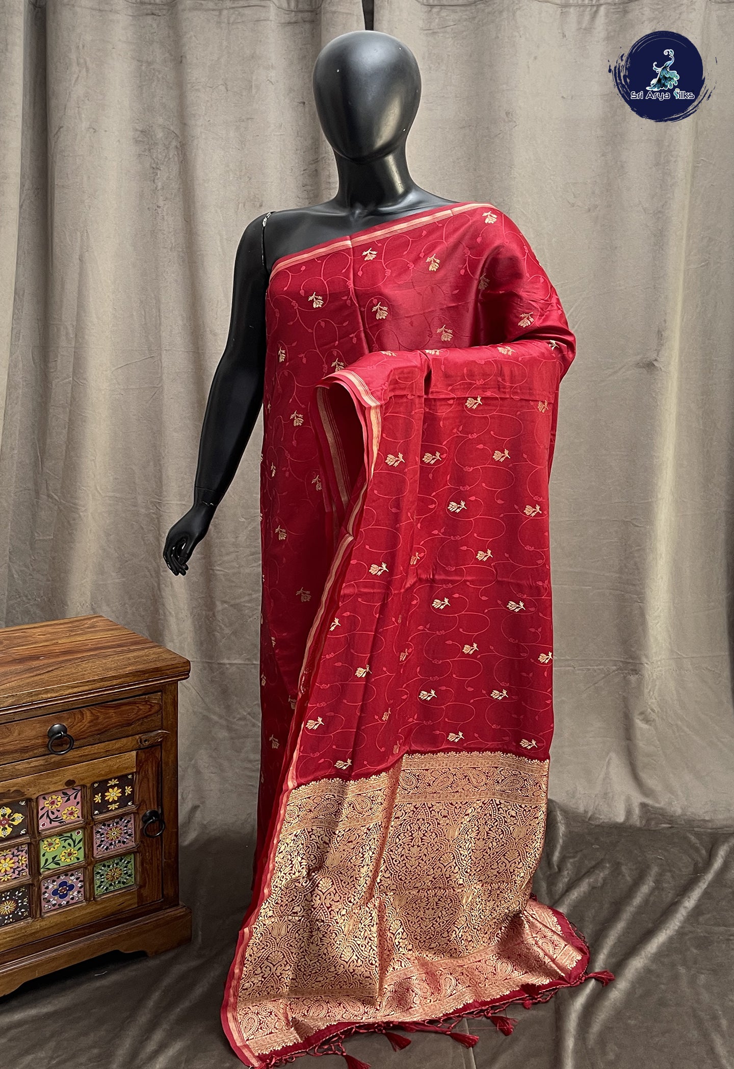 Maroon Semi Soft Silk Saree With Embossed Pattern