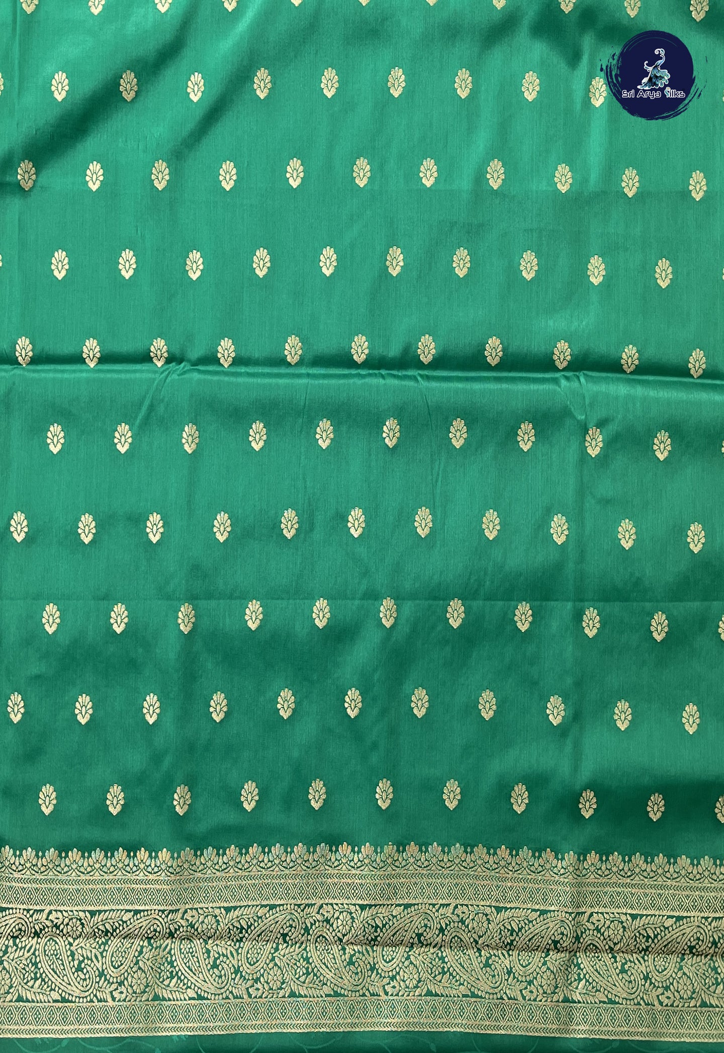 Sapphire Green Semi Soft Silk Saree With Embossed Pattern