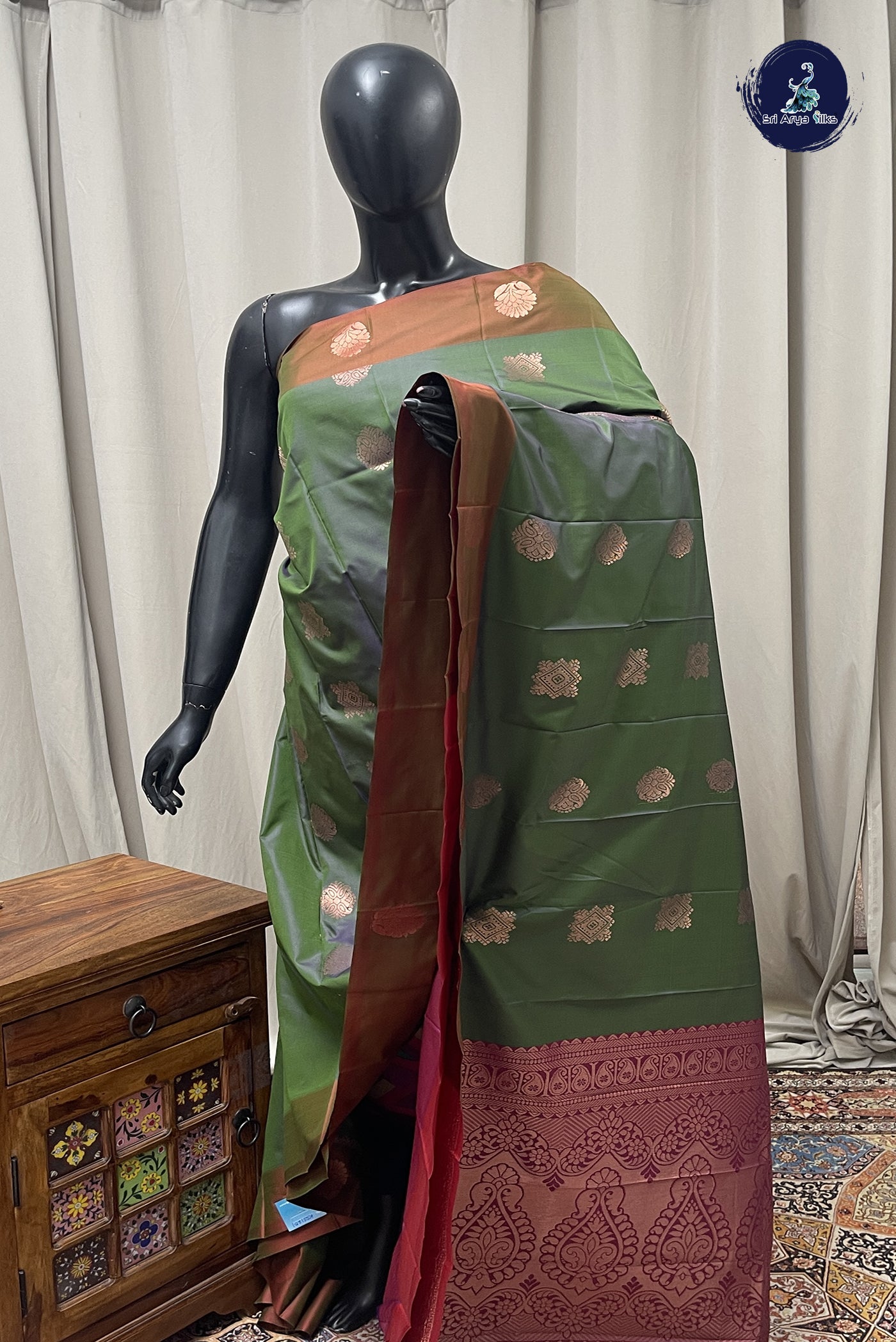 Greenish Grey Semi Soft Silk Saree With Zari Buttas Pattern