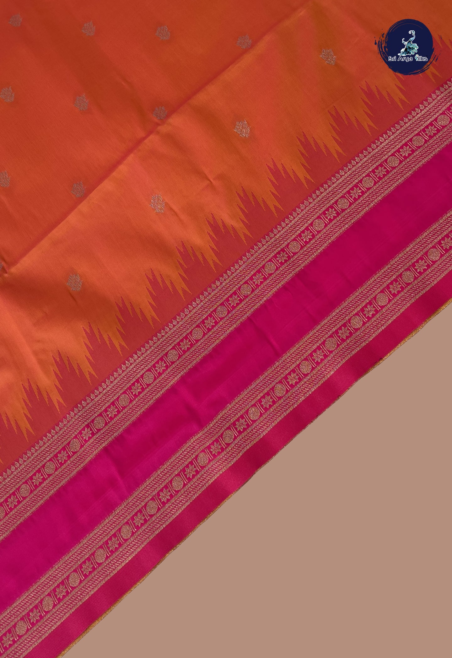 Pinkish Orange Semi Soft Silk Saree With Zari Buttas Pattern