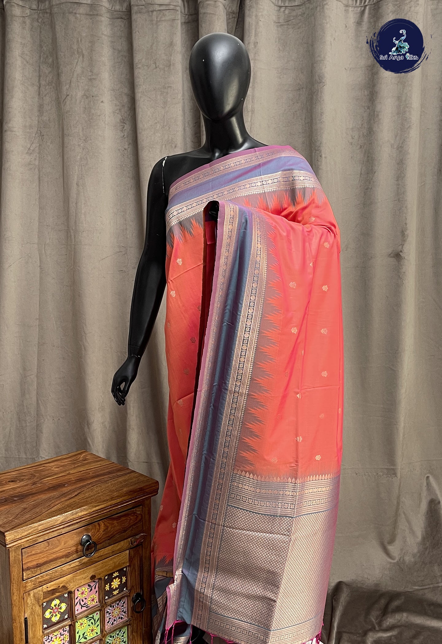 Pinkish Peach Semi Soft Silk Saree With Zari Buttas Pattern