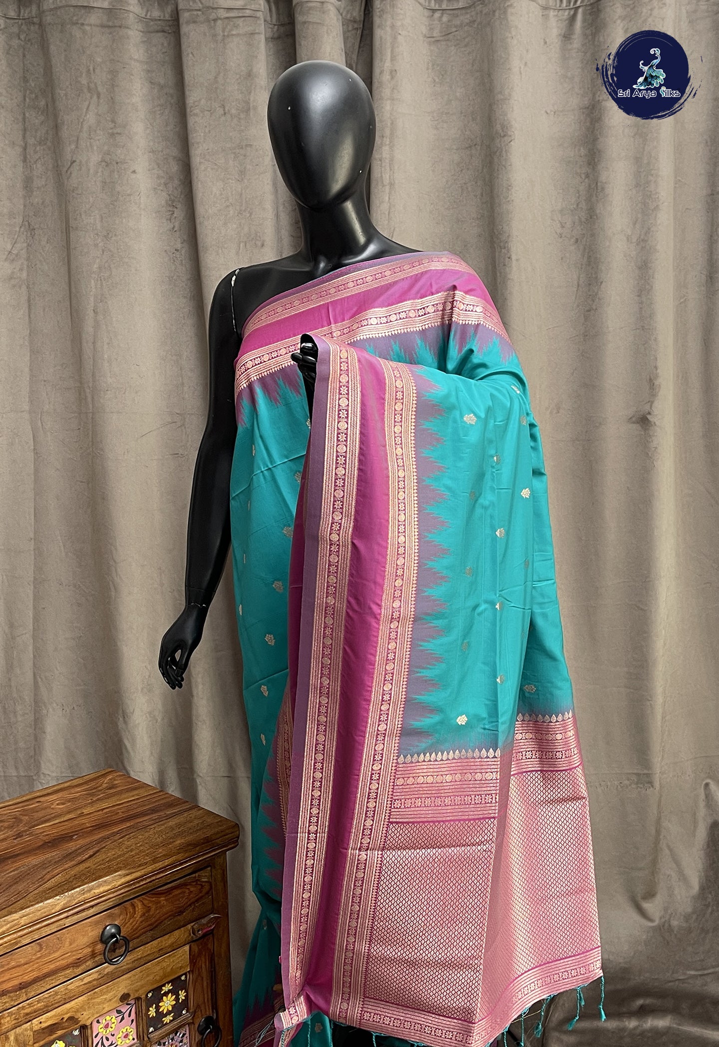Teal Semi Soft Silk Saree With Zari Buttas Pattern