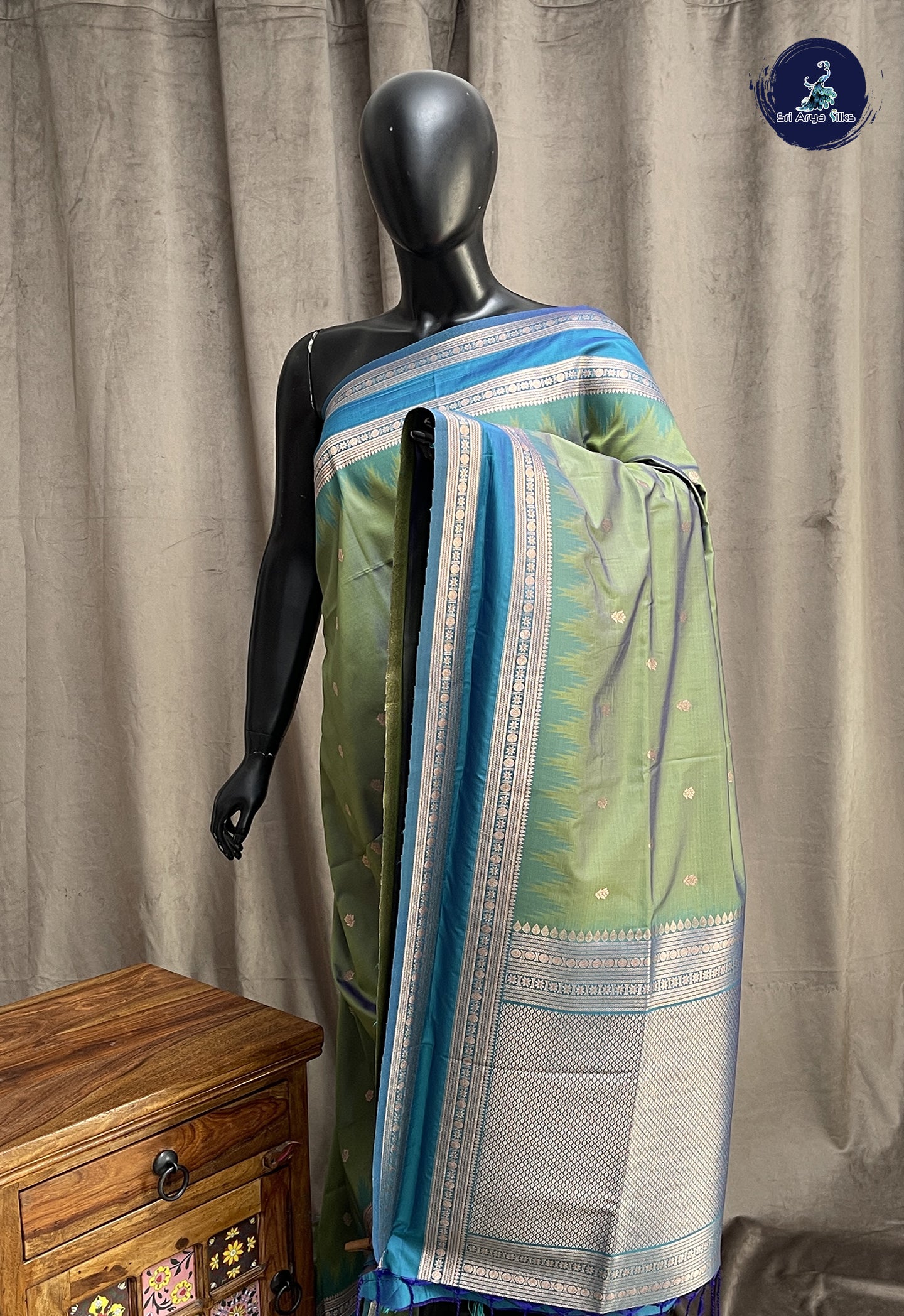 Dual Tone Mehendi Green Semi Soft Silk Saree With Zari Buttas Pattern