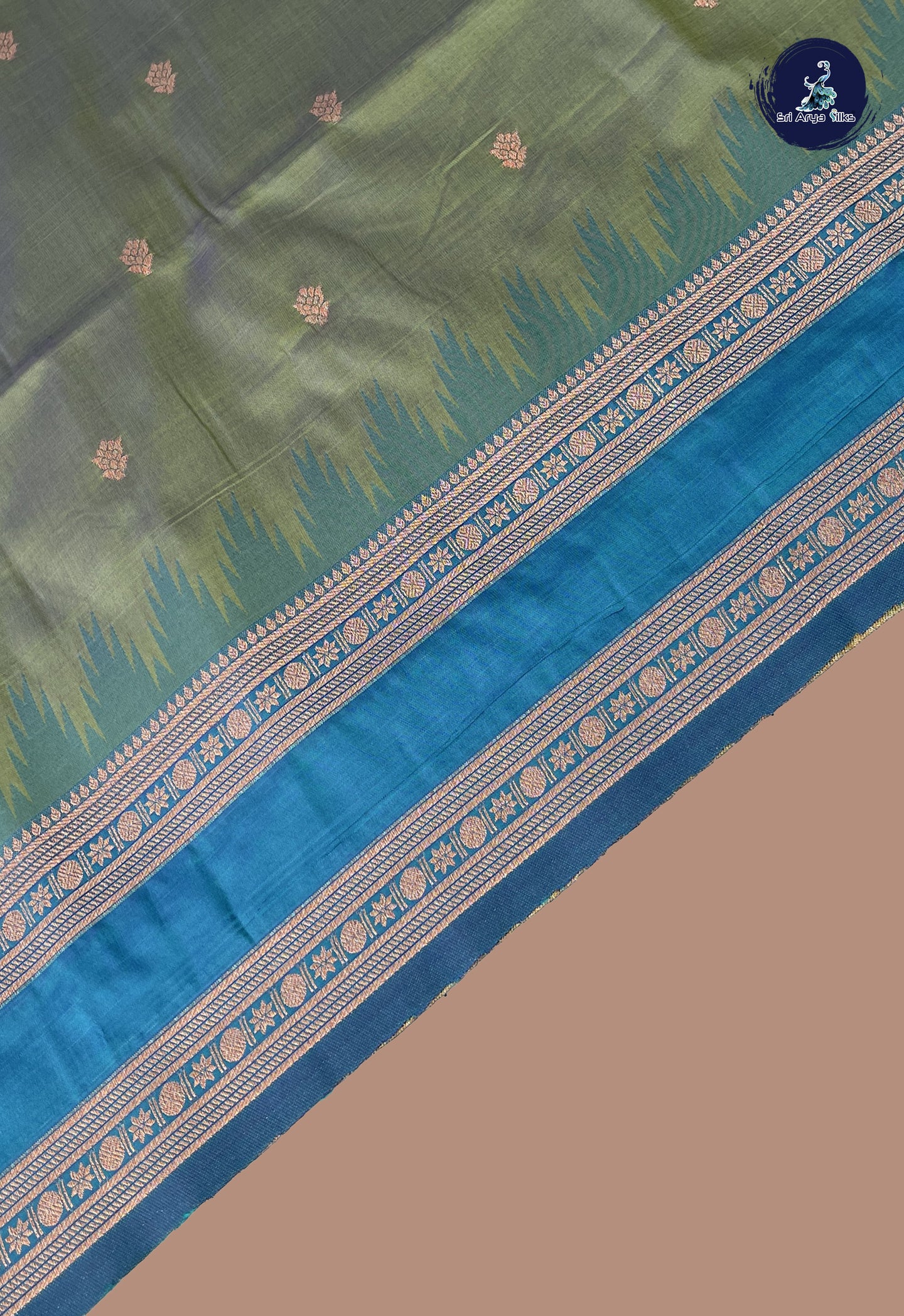 Dual Tone Mehendi Green Semi Soft Silk Saree With Zari Buttas Pattern