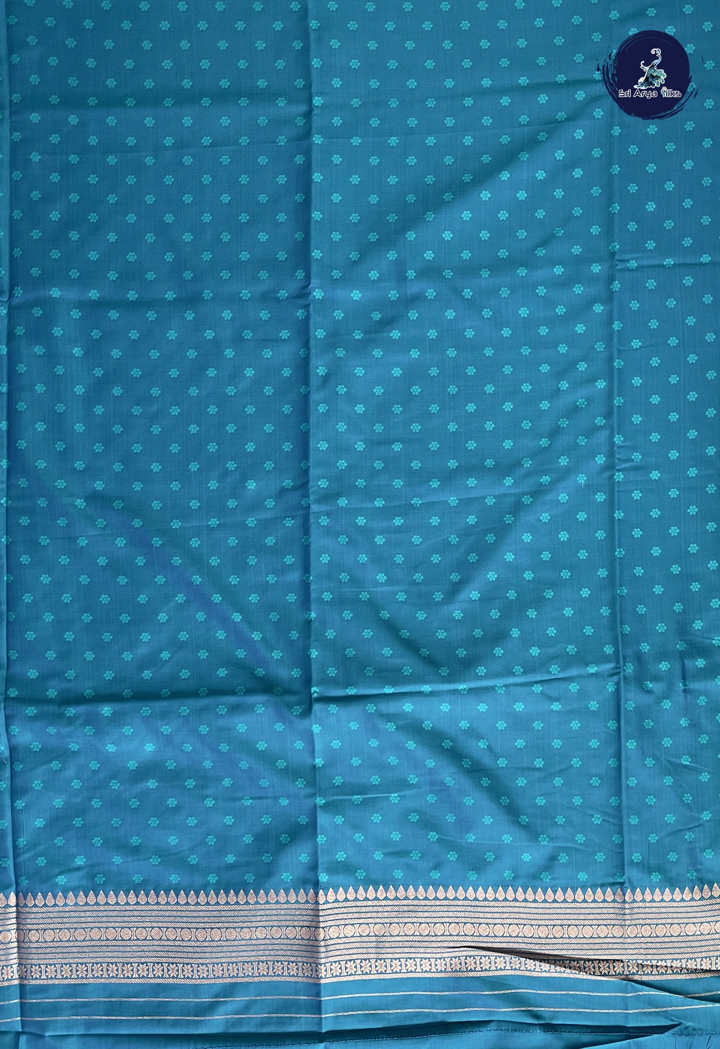 Dual Tone Mehendi Green Semi Soft Silk Saree With Zari Buttas Pattern