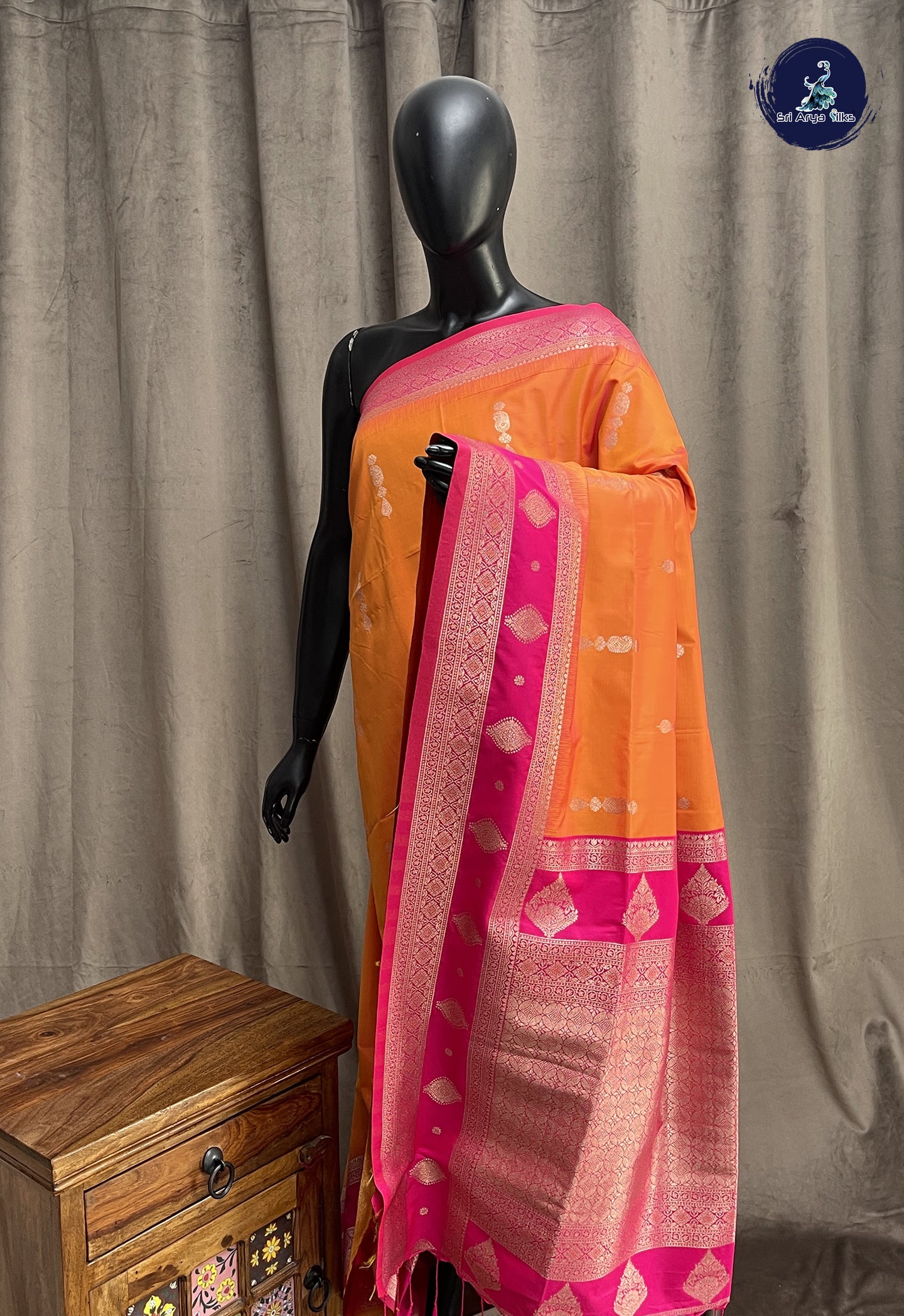 Orange Semi Soft Silk Saree With Zari Buttas Pattern