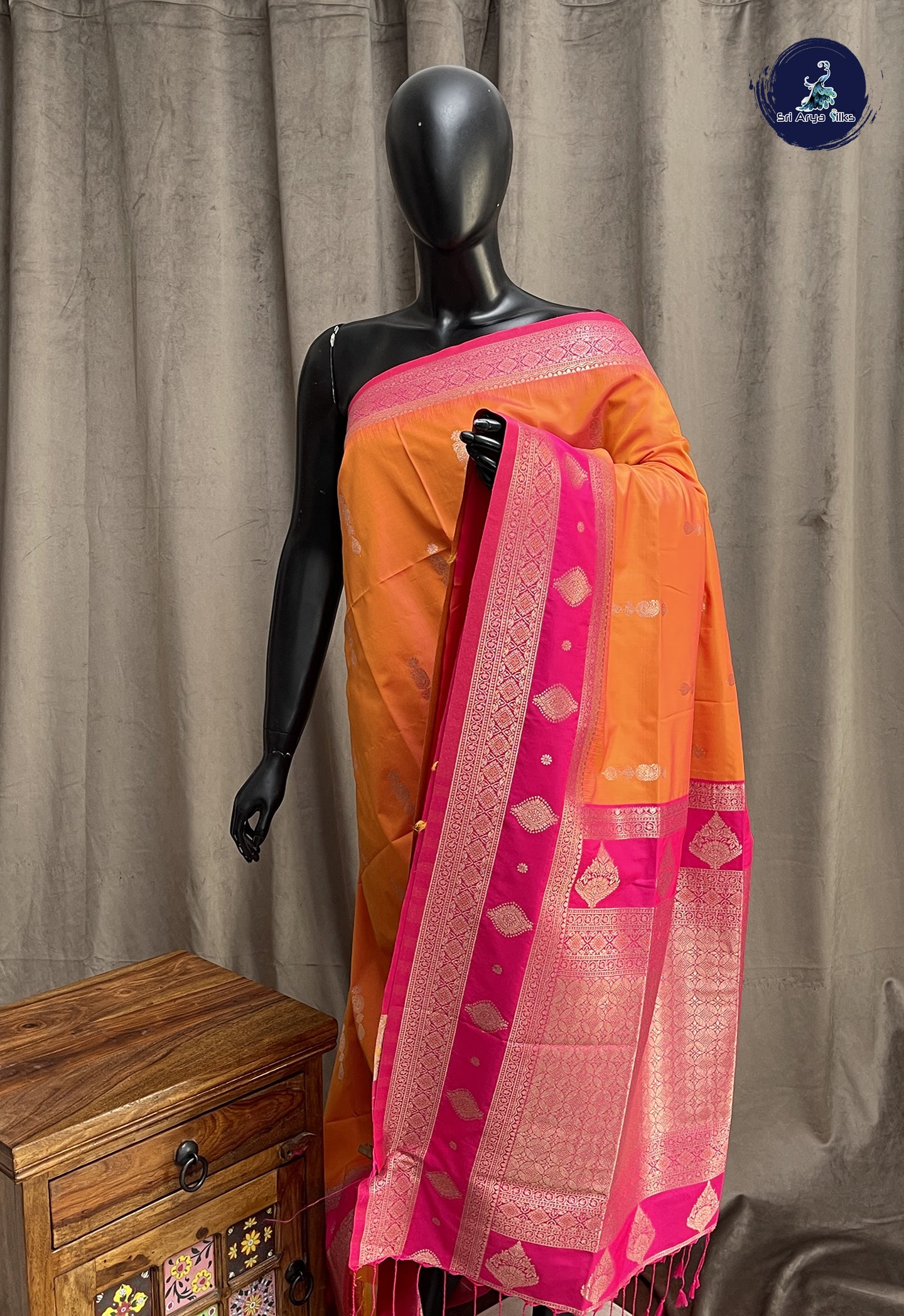Orange Semi Soft Silk Saree With Zari Buttas Pattern