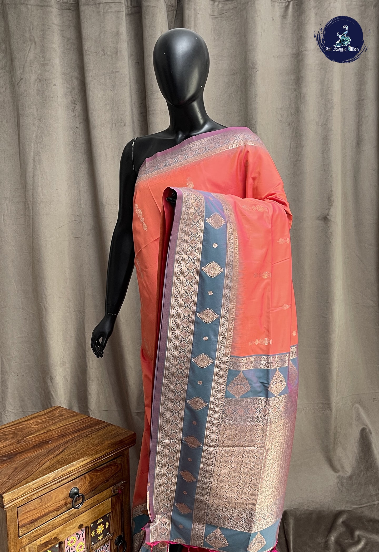 Peach Semi Soft Silk Saree With Zari Buttas Pattern