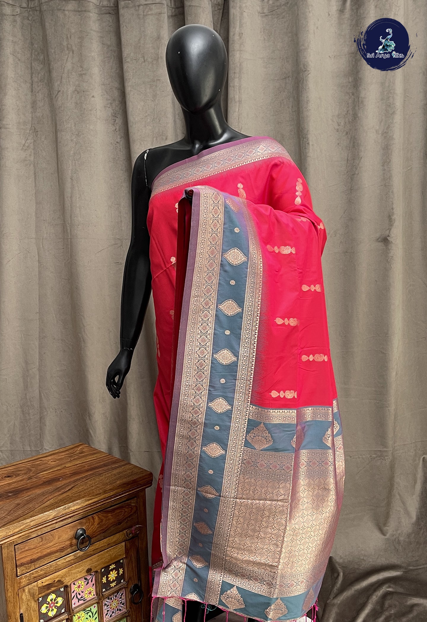 Reddish Pink Semi Soft Silk Saree With Zari Buttas Pattern