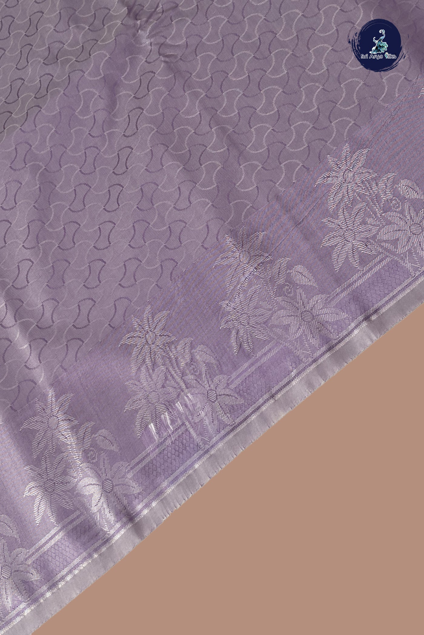 Lavender Semi Soft Silk Saree With Embossed Pattern