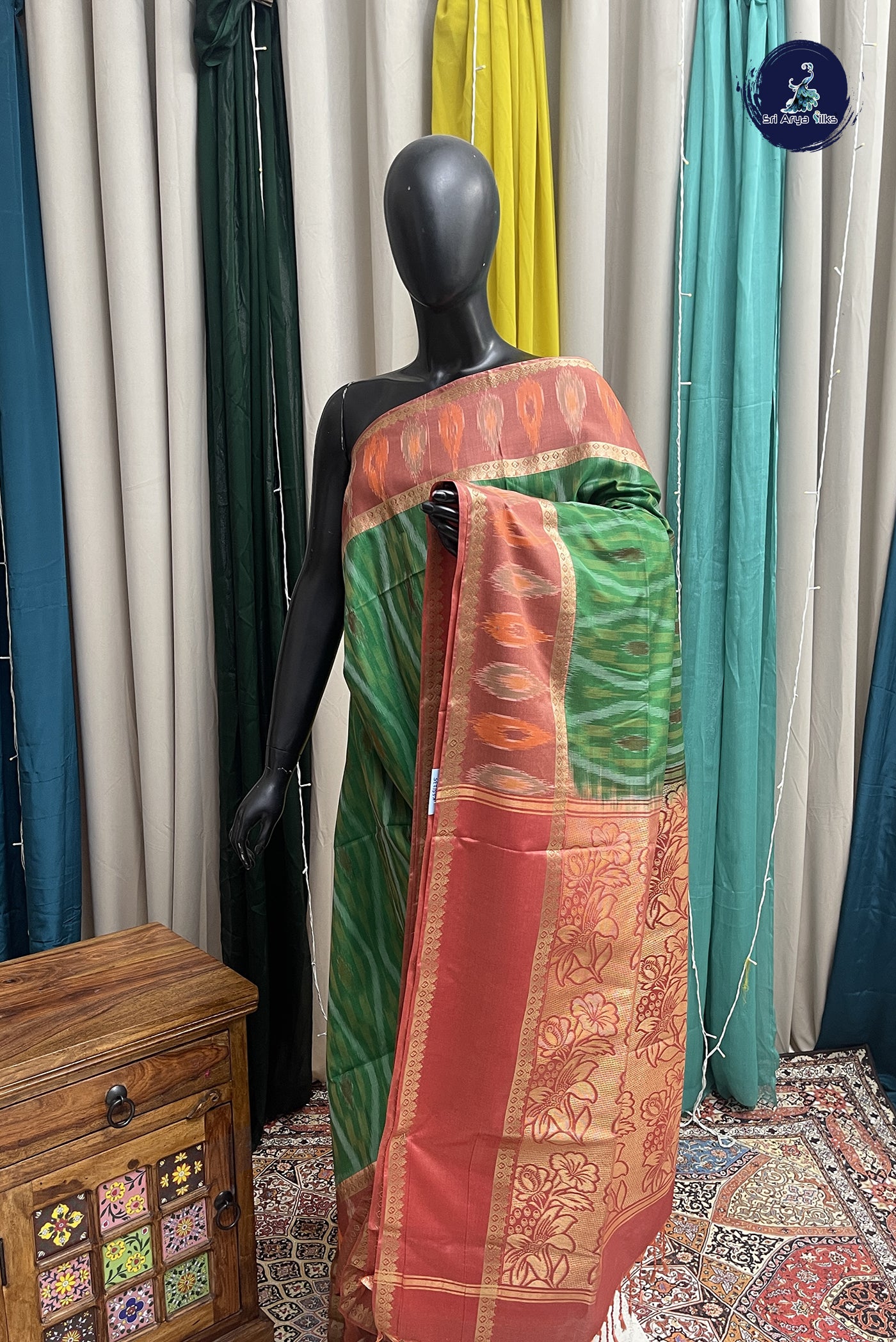 Green Semi Soft Silk Saree With Ikat Pattern