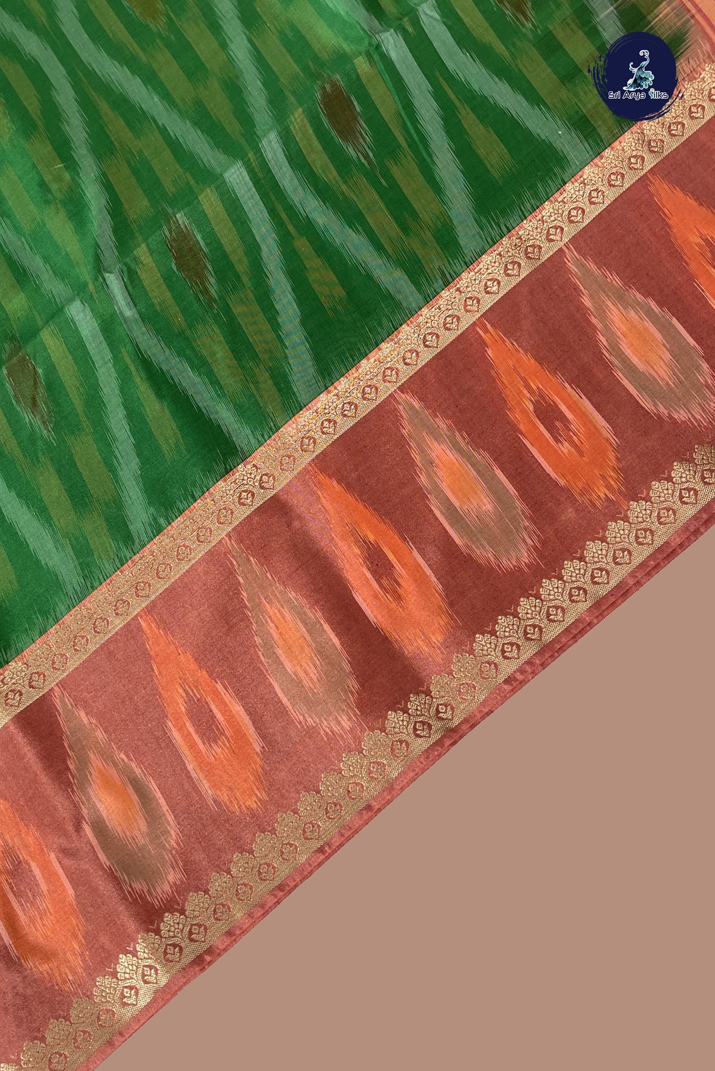 Green Semi Soft Silk Saree With Ikat Pattern