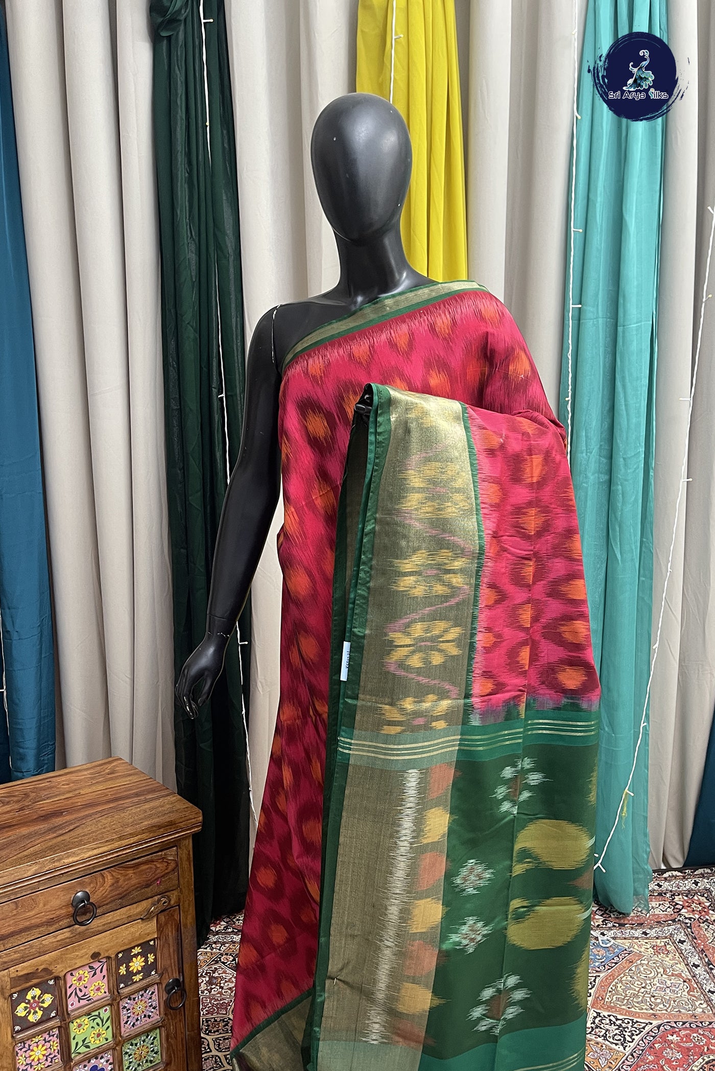 Reddish Pink Semi Soft Silk Saree With Ikat Pattern