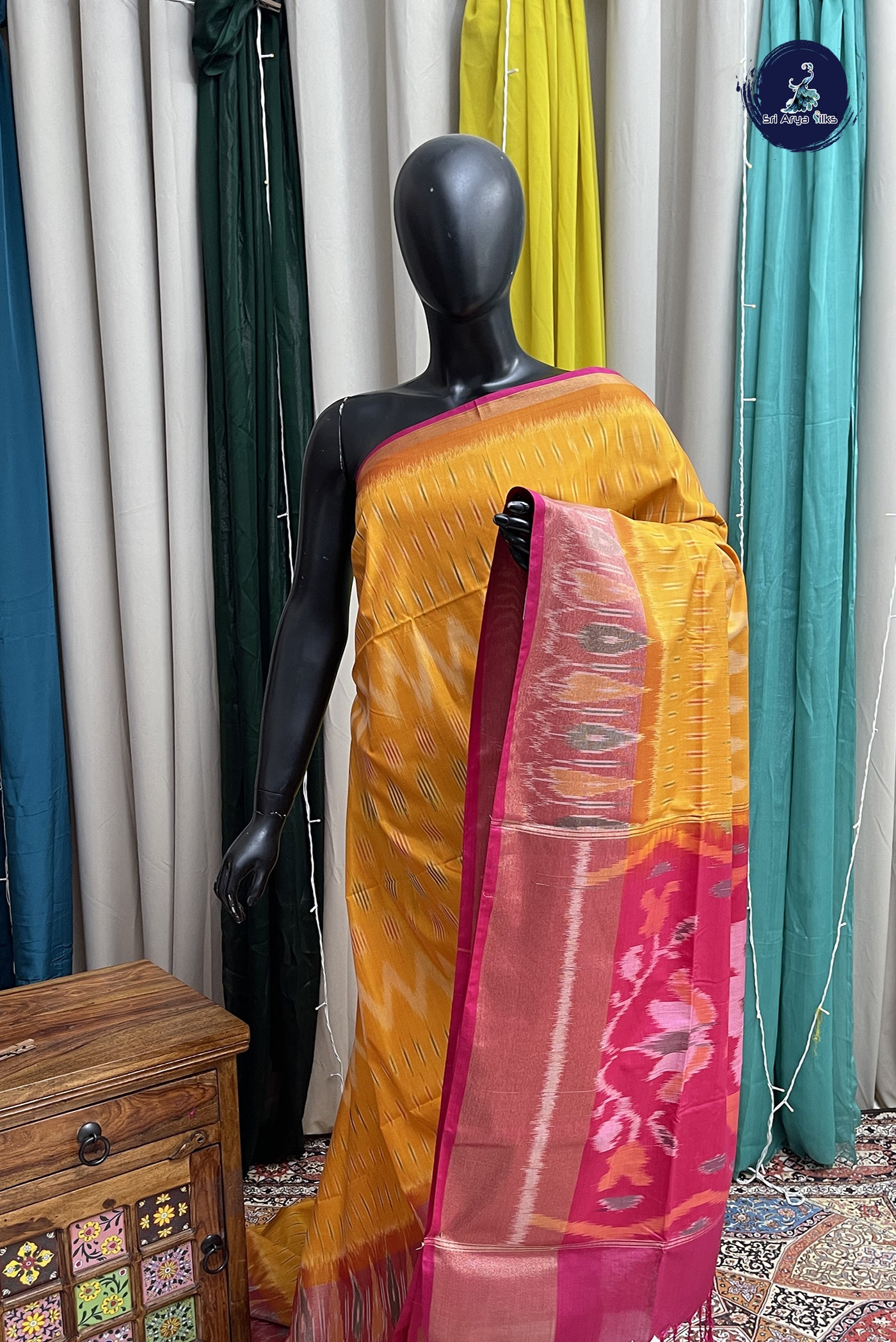 Yellow Semi Soft Silk Saree With Ikat Pattern