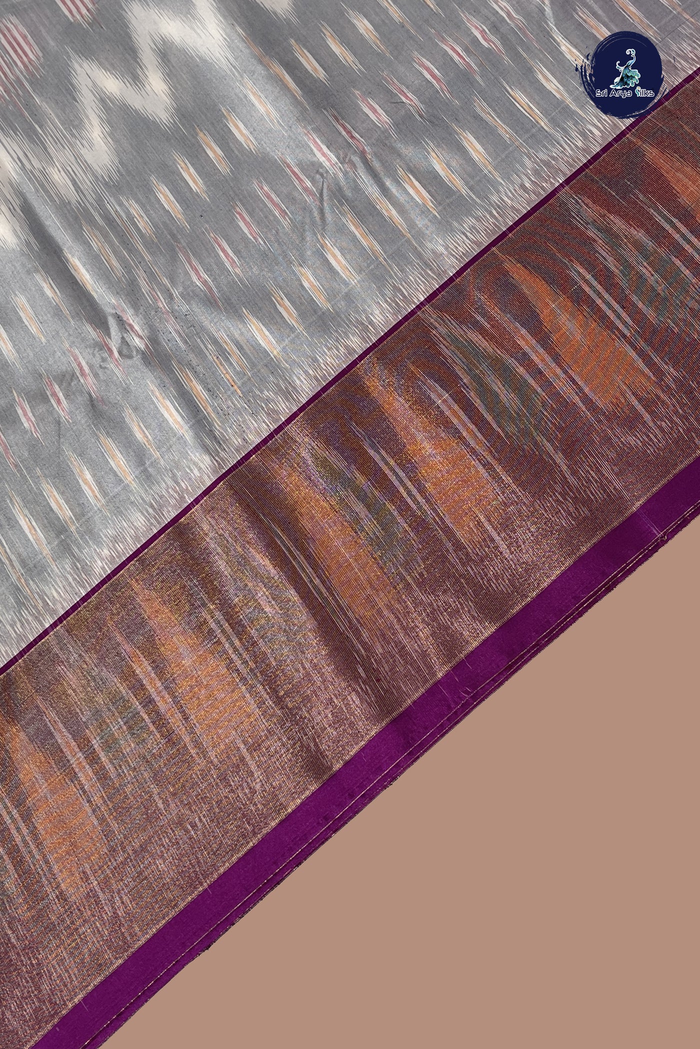 Silver Grey Semi Soft Silk Saree With Ikat Pattern