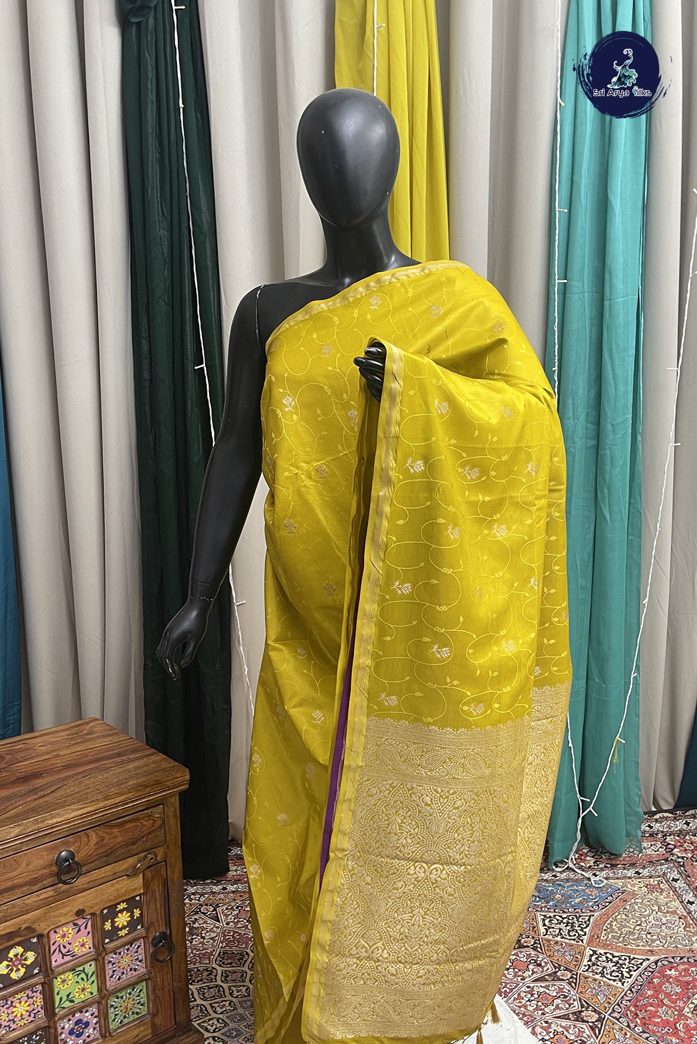 Yellow Semi Silk Saree With Embossed Pattern