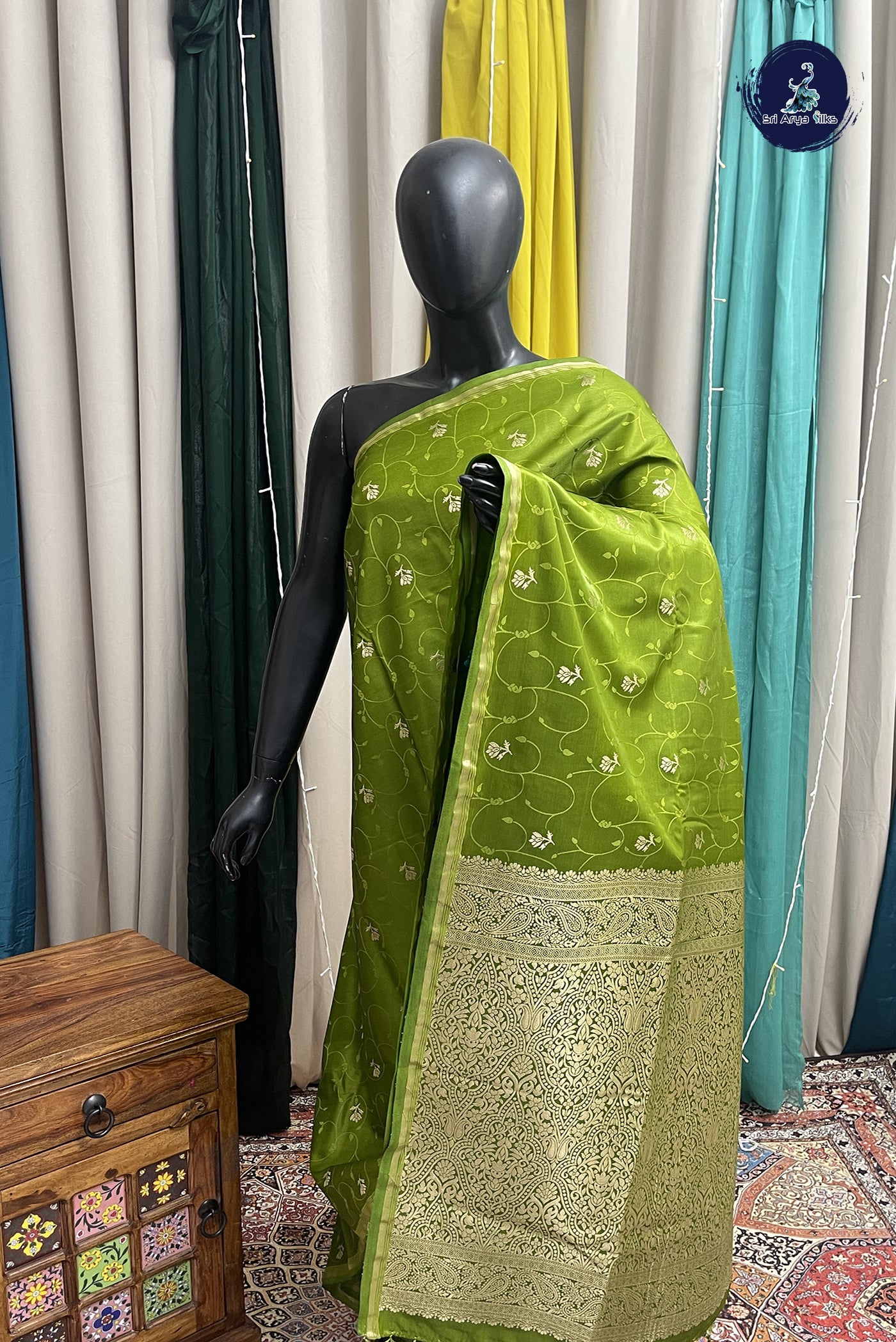 Mehendi Green Semi Silk Saree With Embossed Pattern