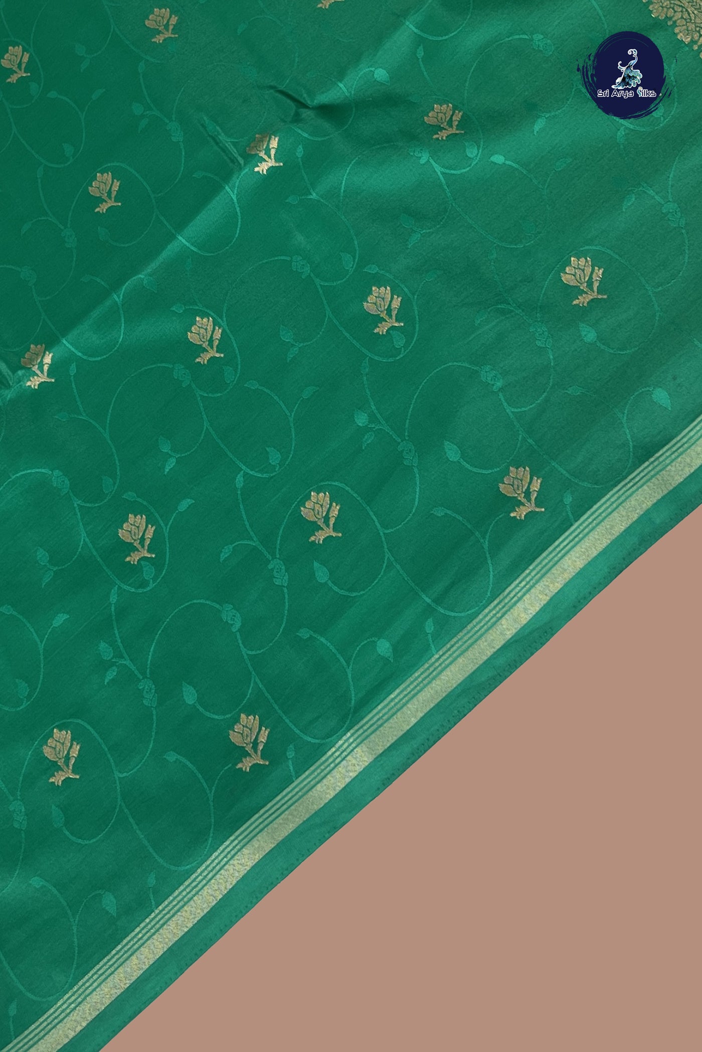 Green Semi Silk Saree With Embossed Pattern