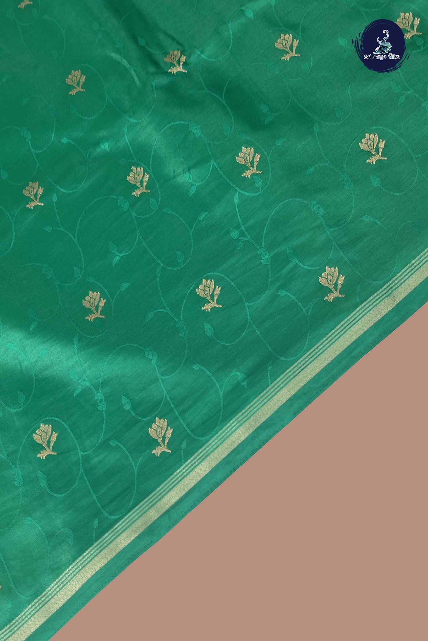 Green Semi Silk Saree With Embossed Pattern