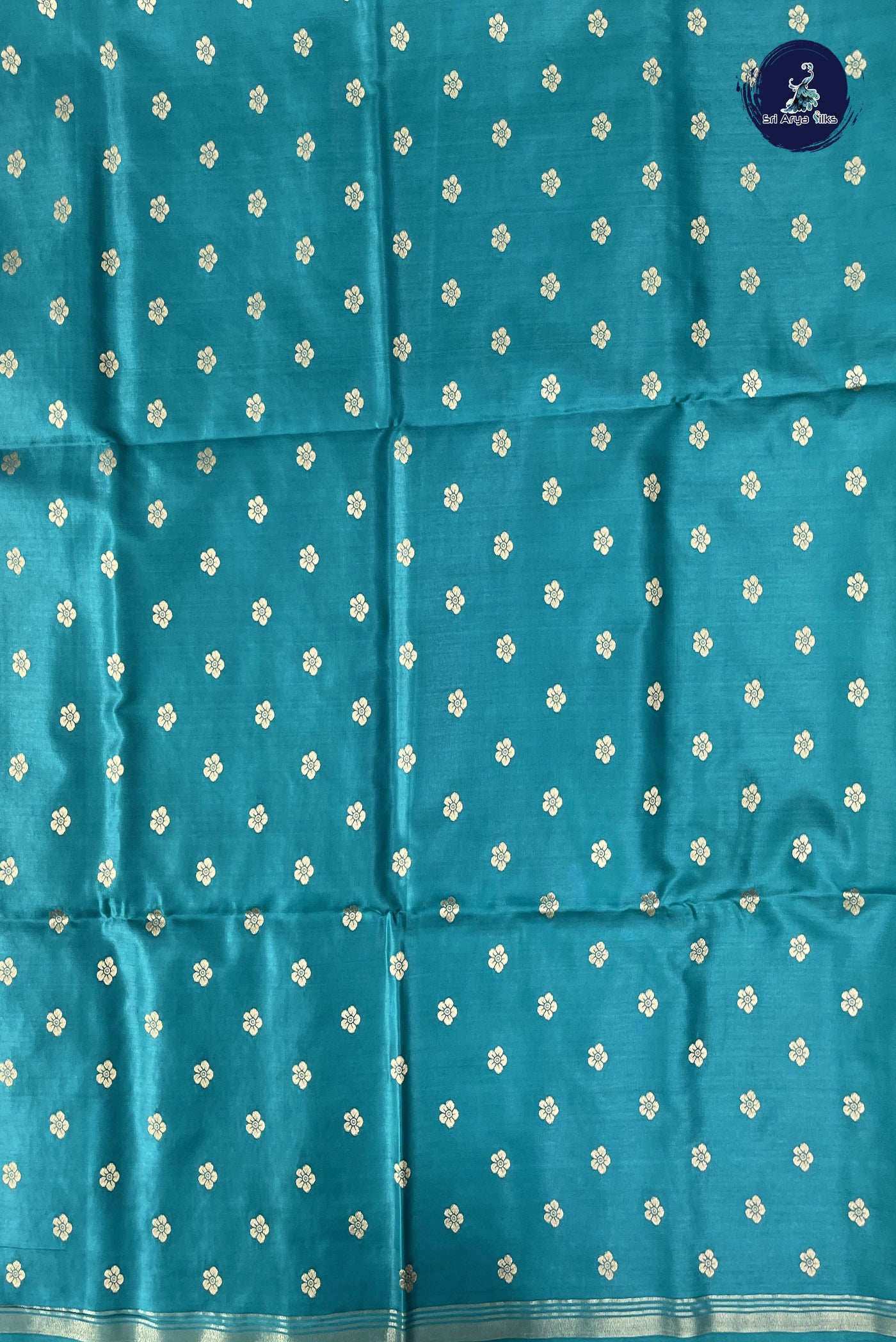 Teal Semi Silk Saree With Zari Buttas Pattern