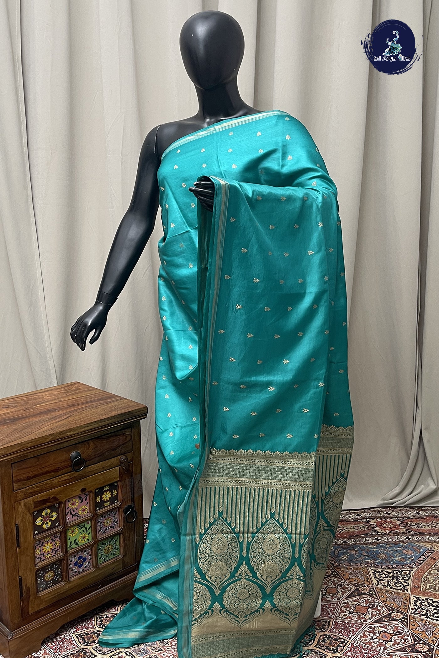 Teal Semi Silk Saree With Zari Buttas Pattern