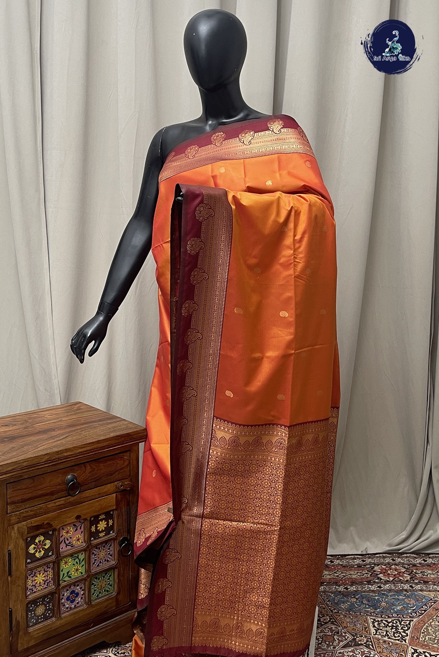 Lite Mustard Orange Semi Silk Saree With Zari Buttas Pattern