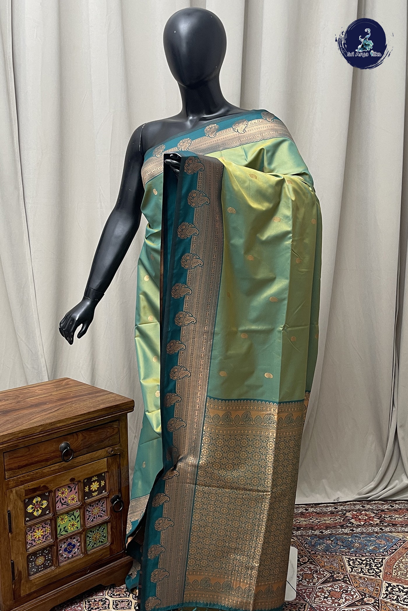 Dual Tone Green Semi Silk Saree With Zari Buttas Pattern