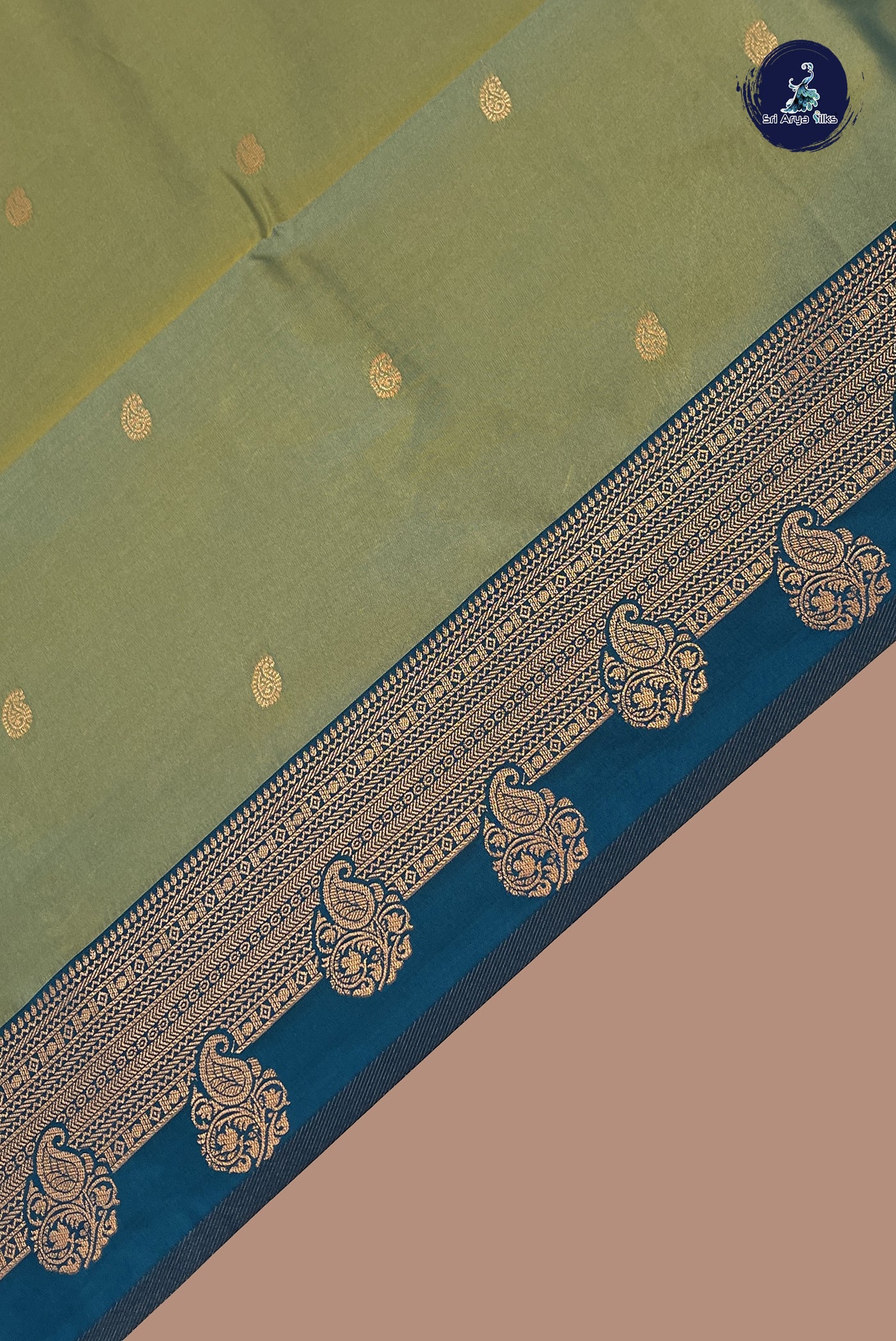 Bluish Green Semi Silk Saree With Zari Buttas Pattern